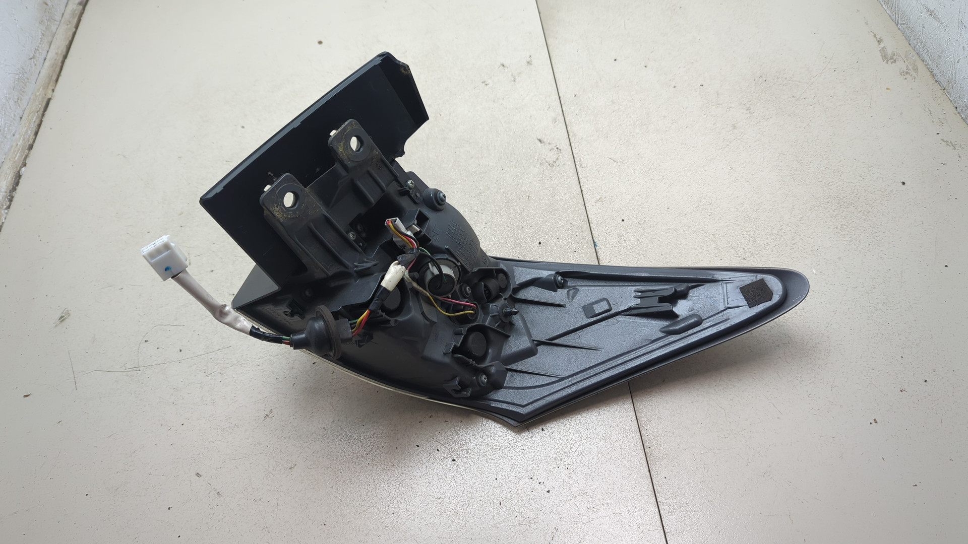 Фонарь задний левый