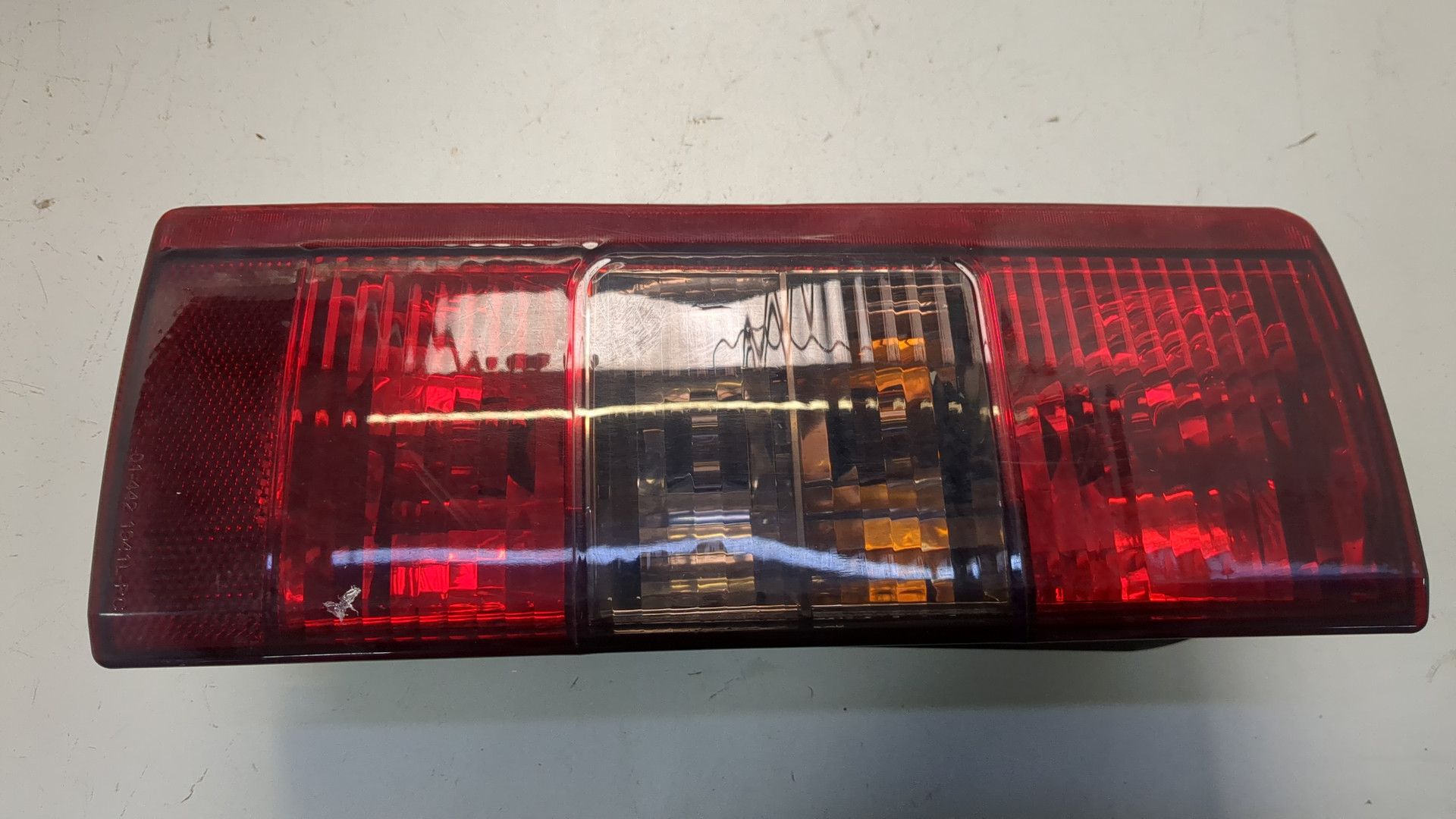 Фонарь задний левый