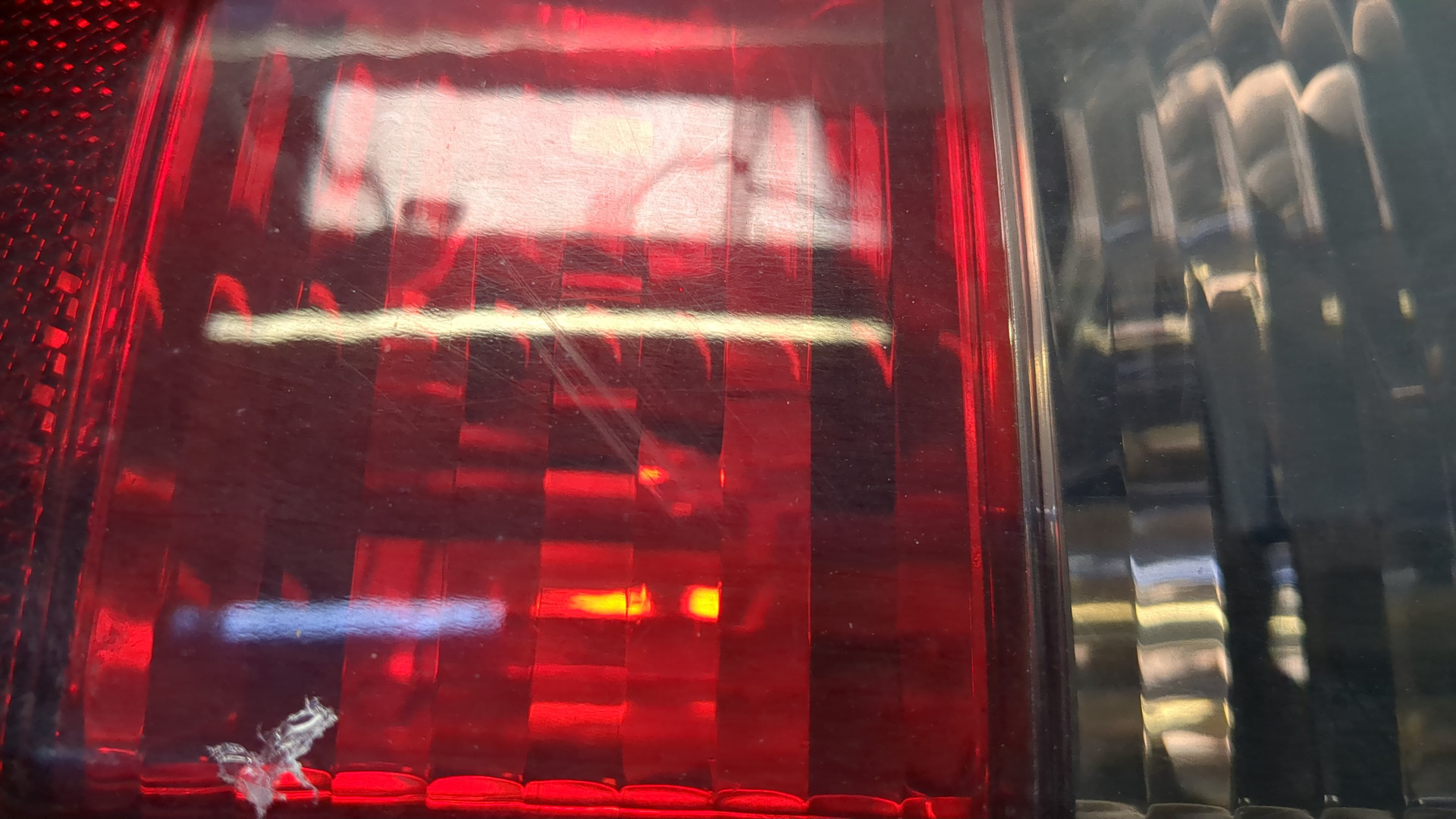 Фонарь задний левый