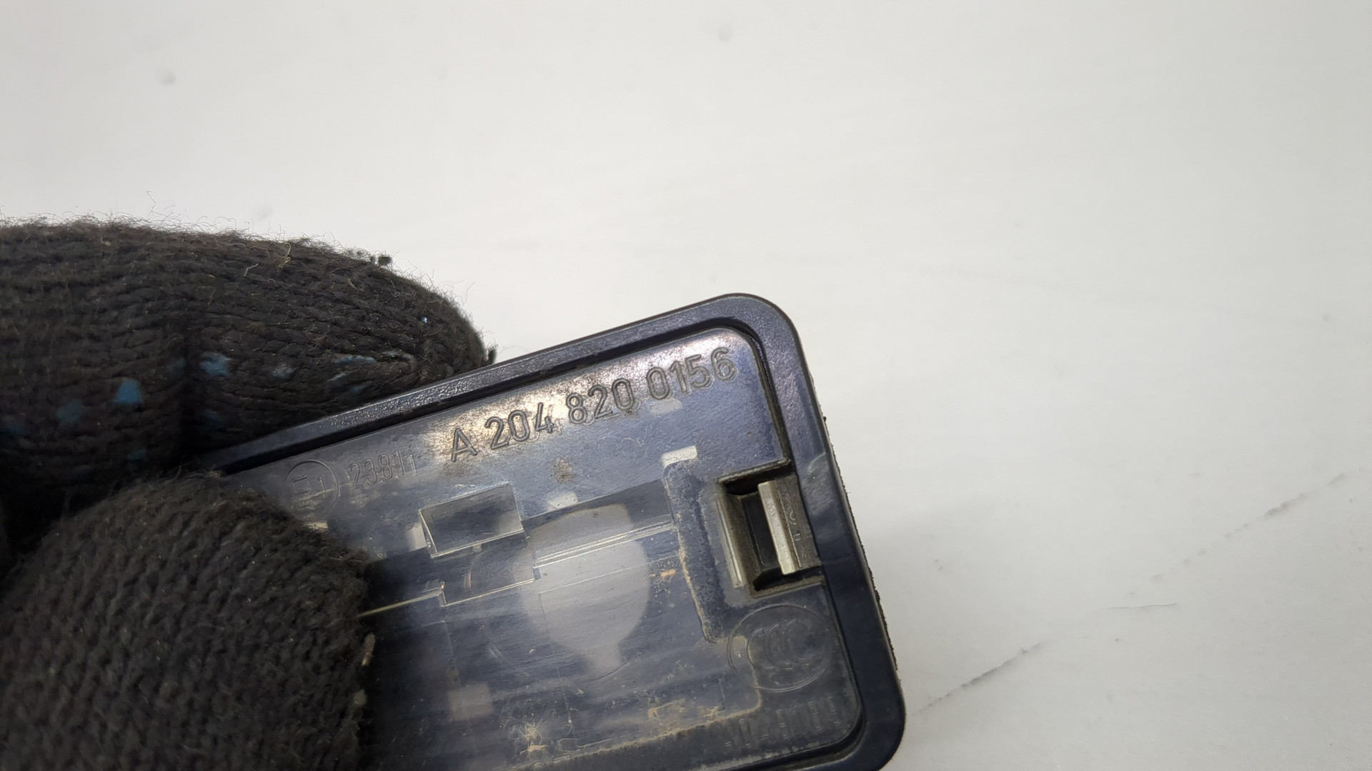 Фонарь подсветки номера