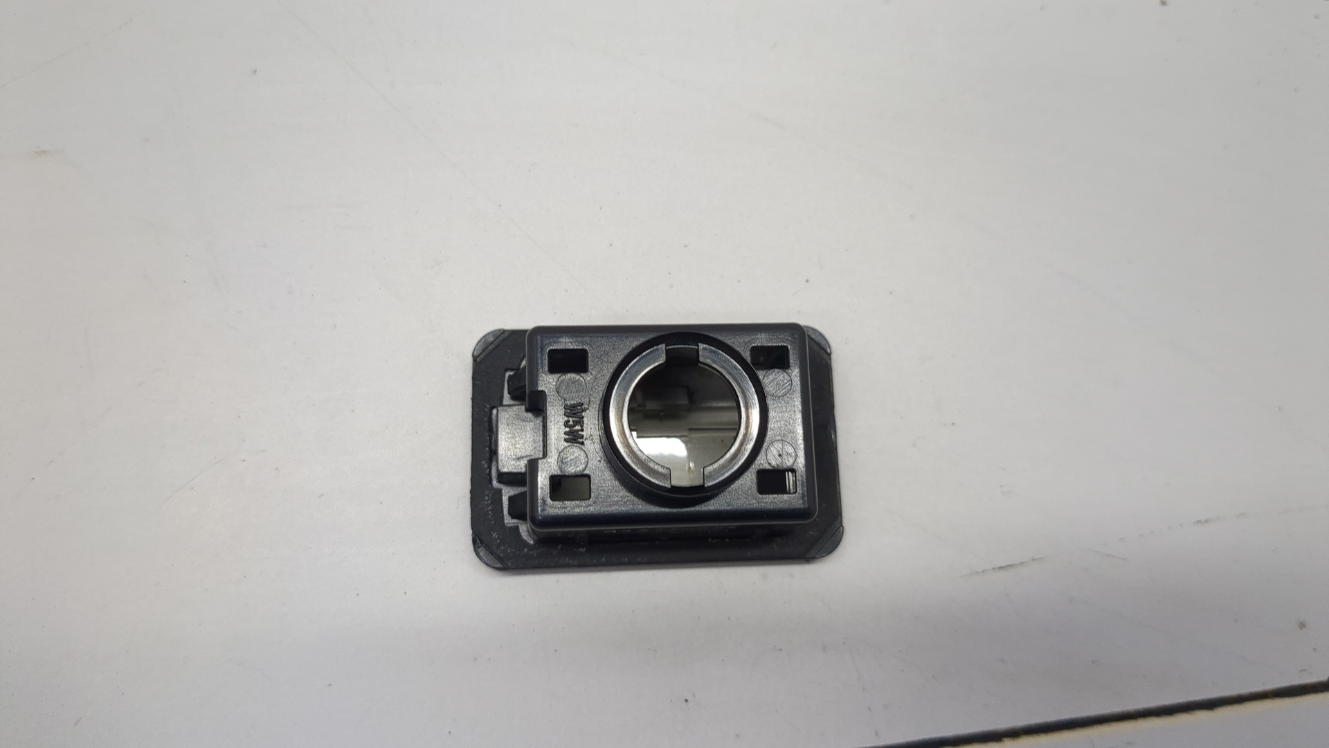 Фонарь подсветки номера