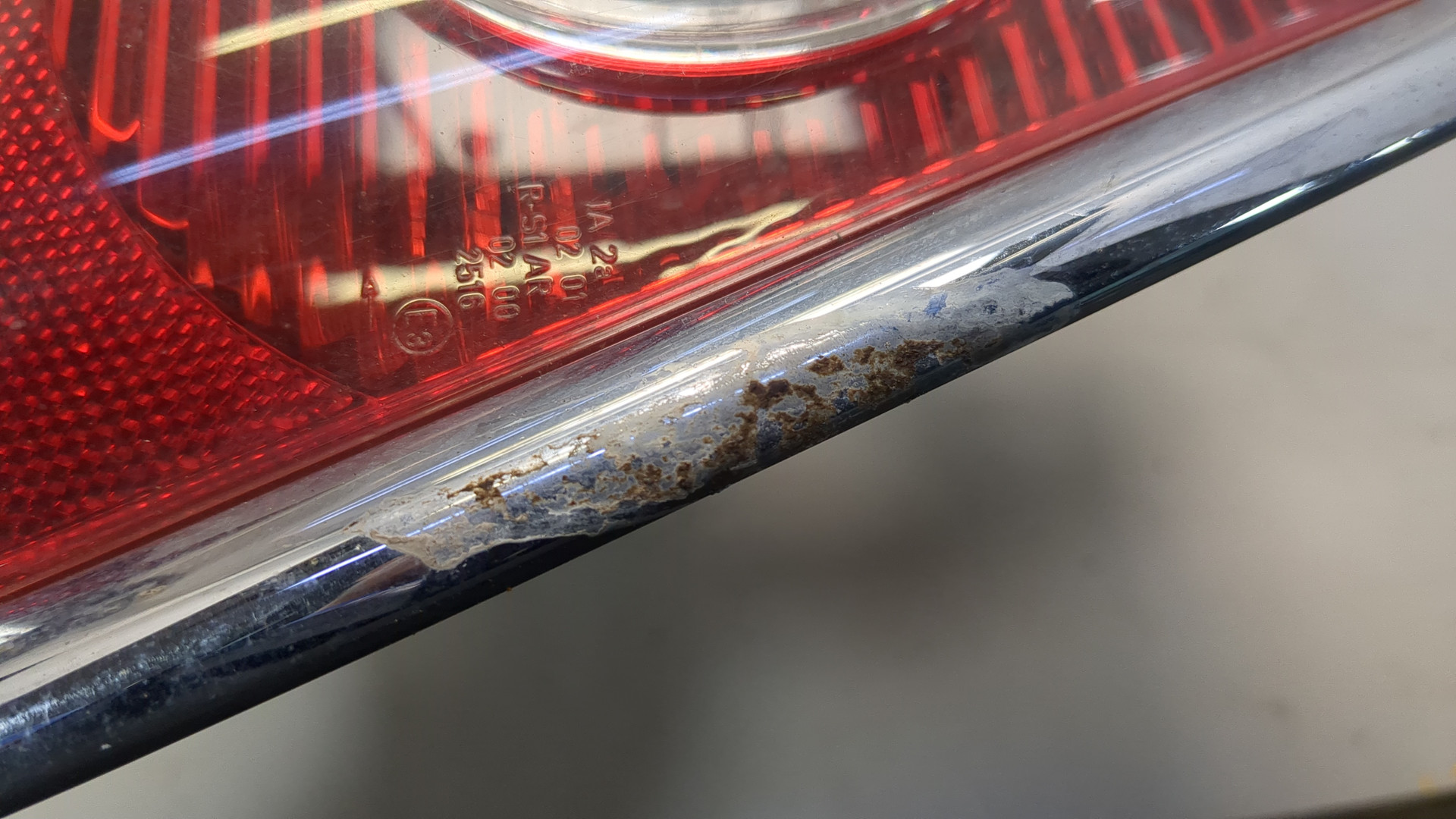 Фонарь задний левый