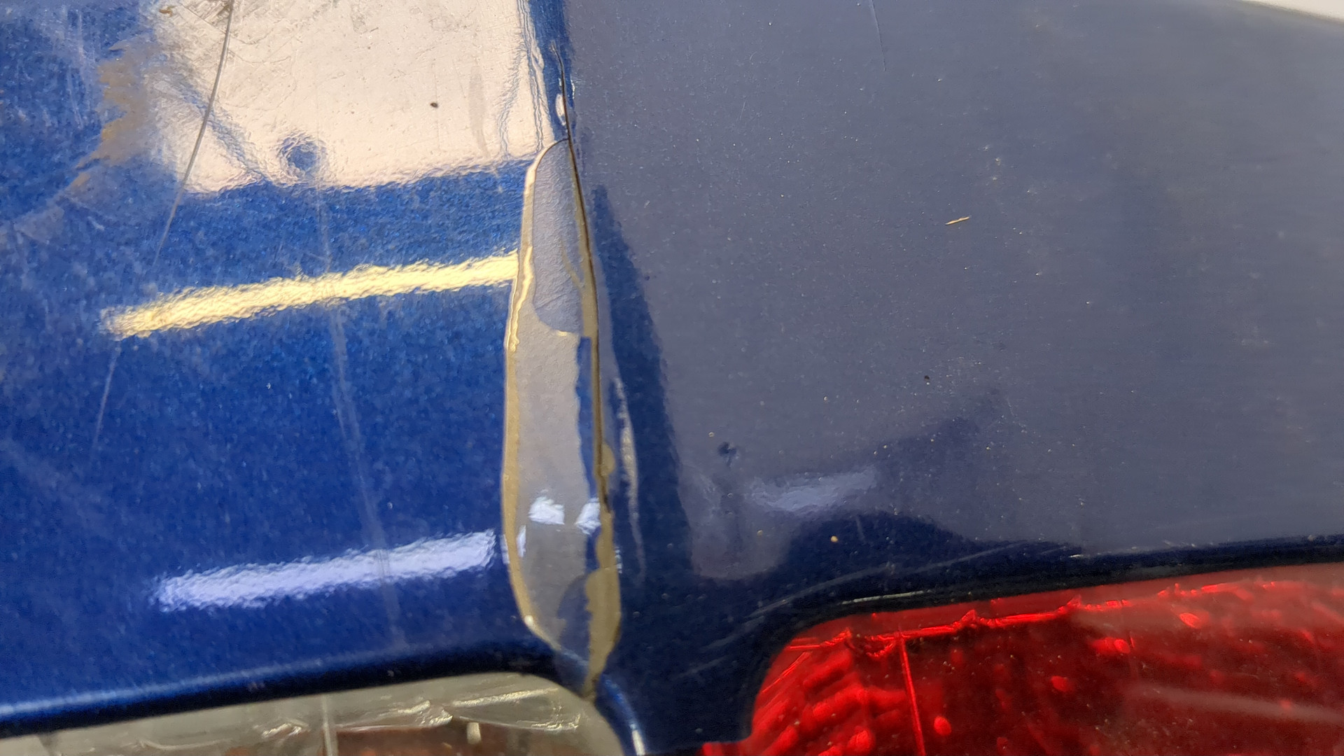 Фонарь задний левый