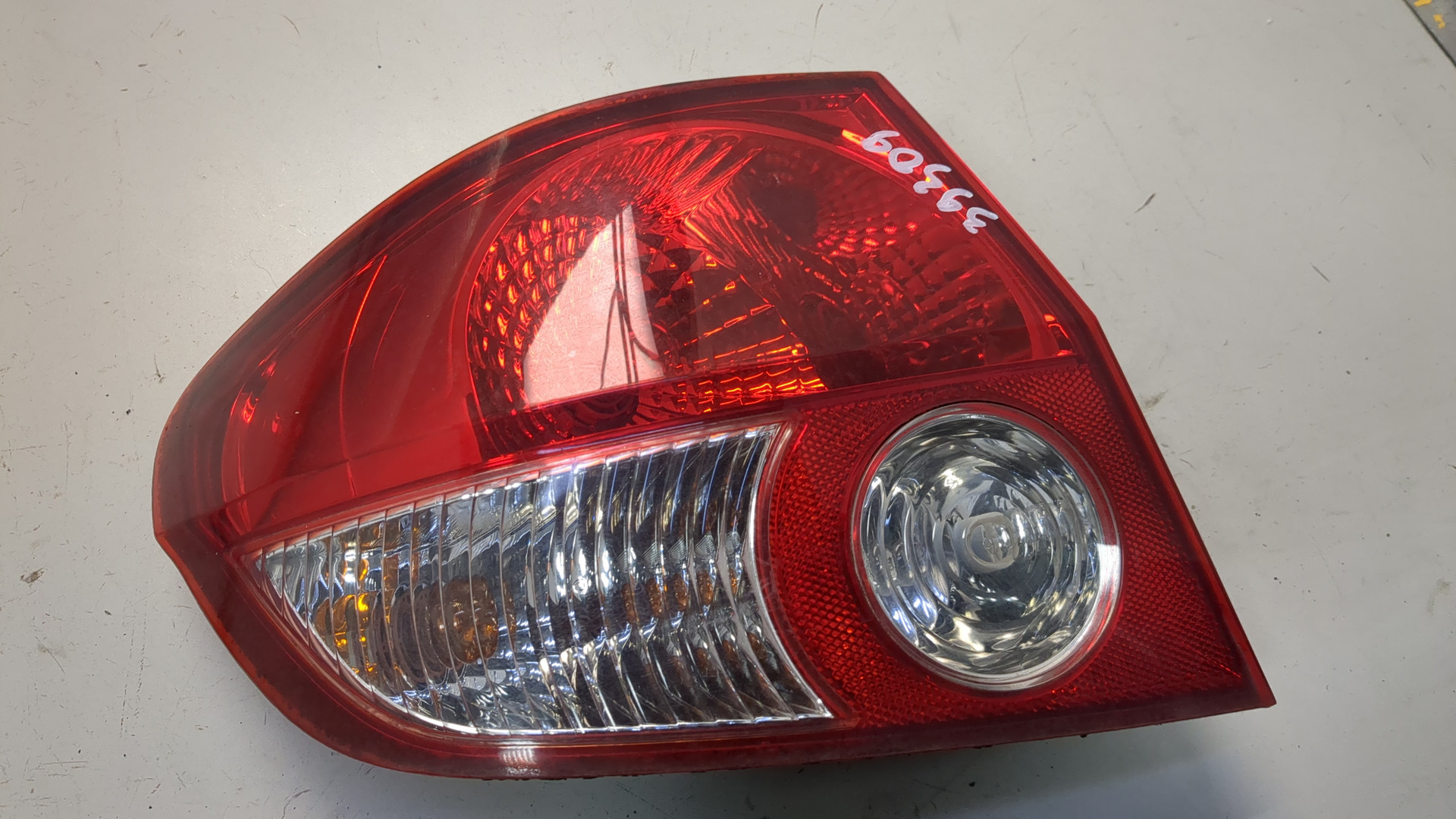 Фонарь задний левый