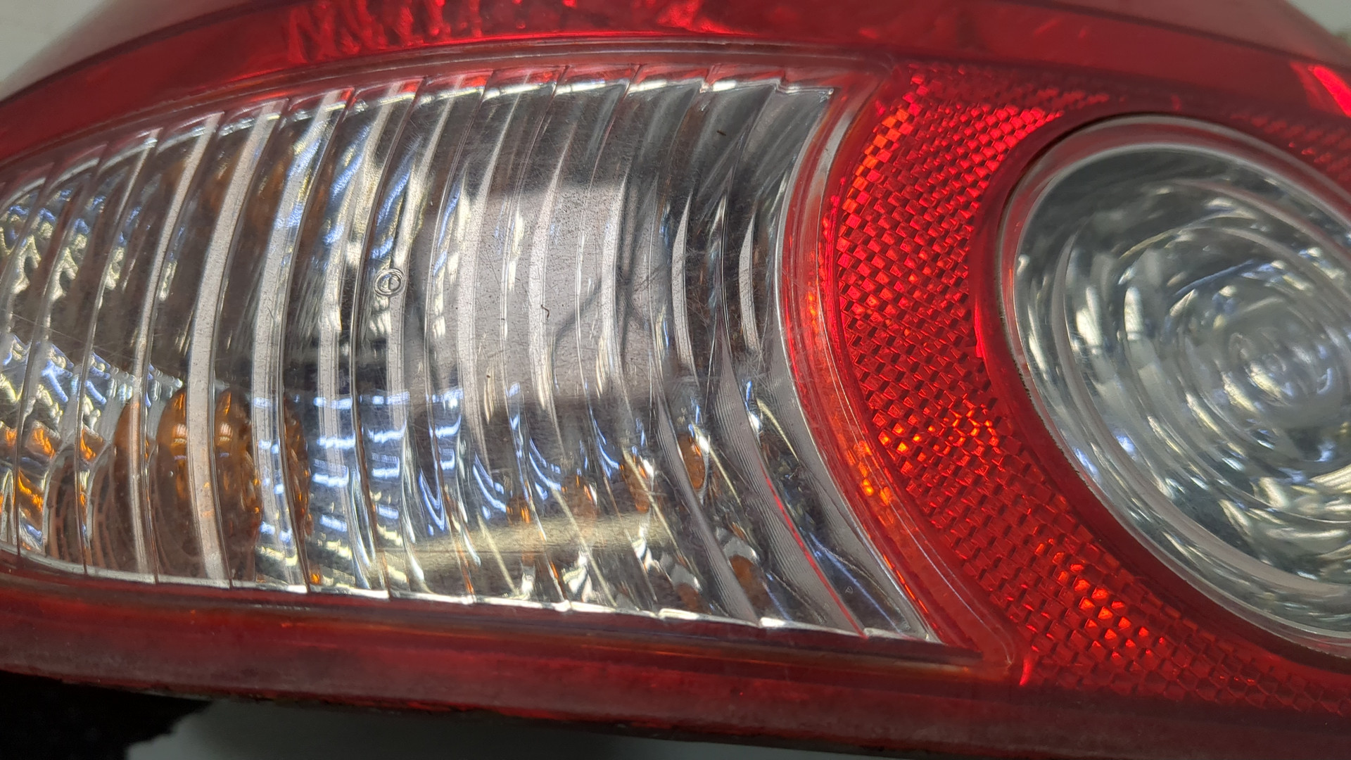 Фонарь задний левый