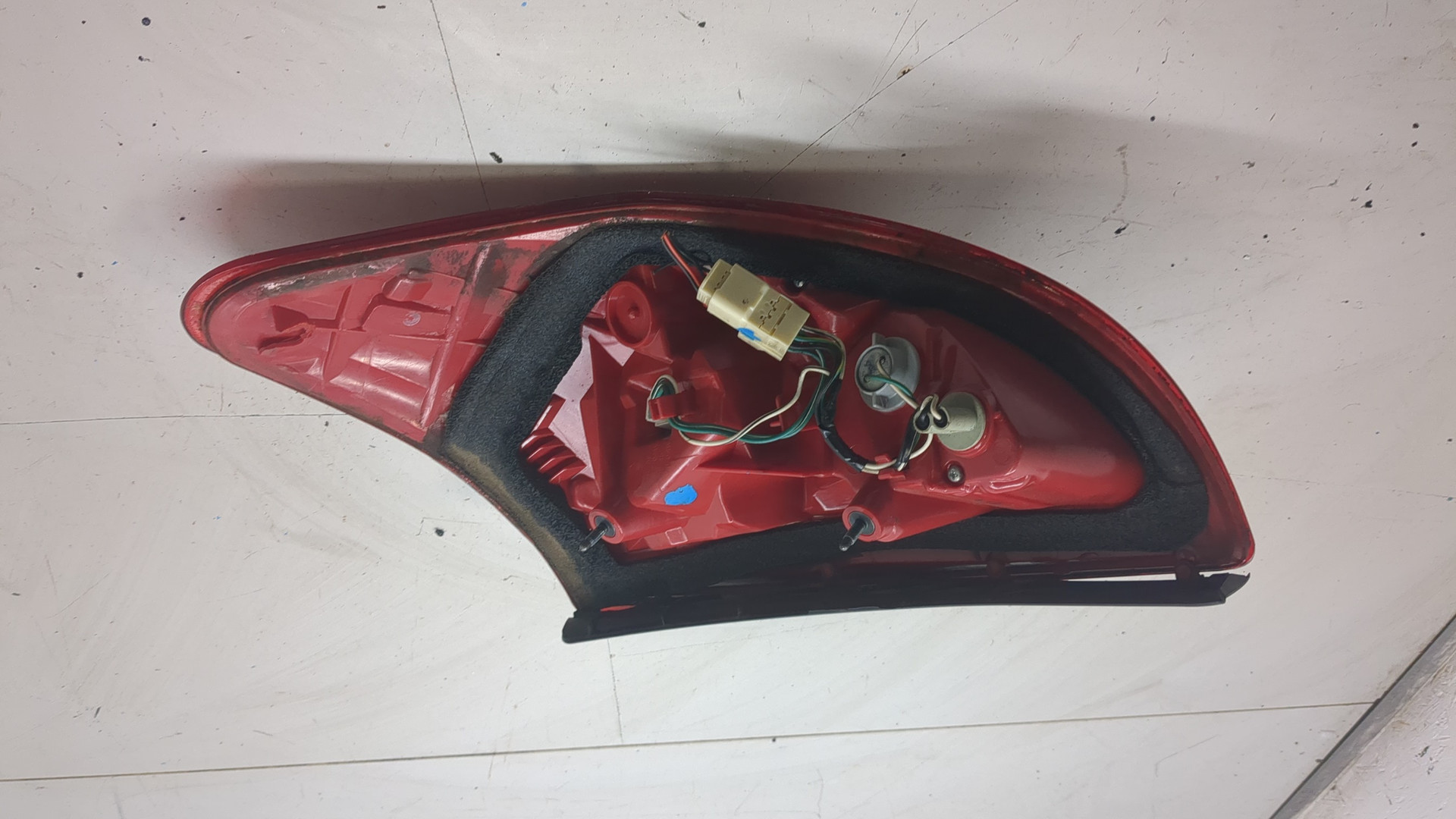 Фонарь задний левый