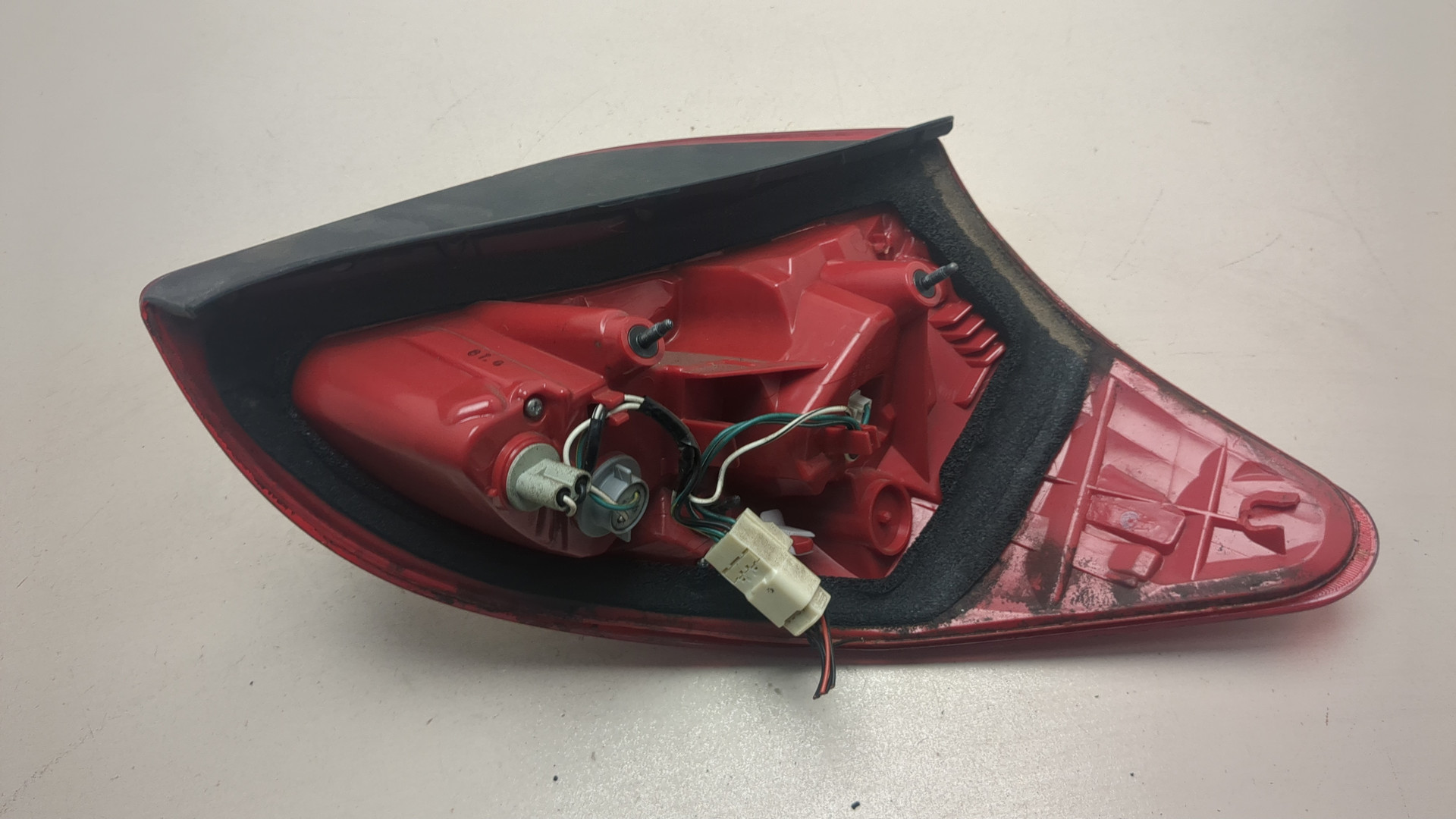 Фонарь задний левый