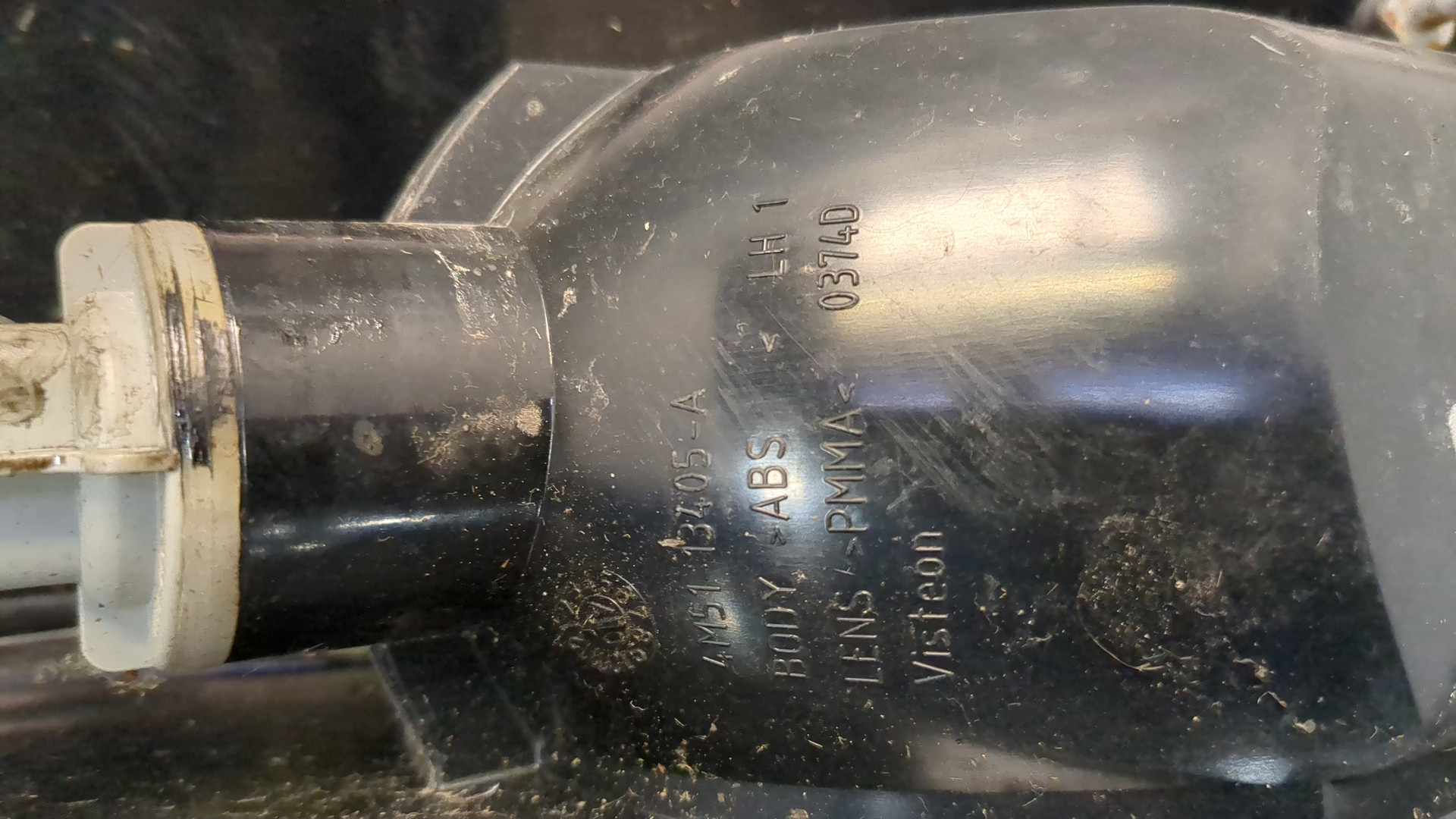 Фонарь задний левый