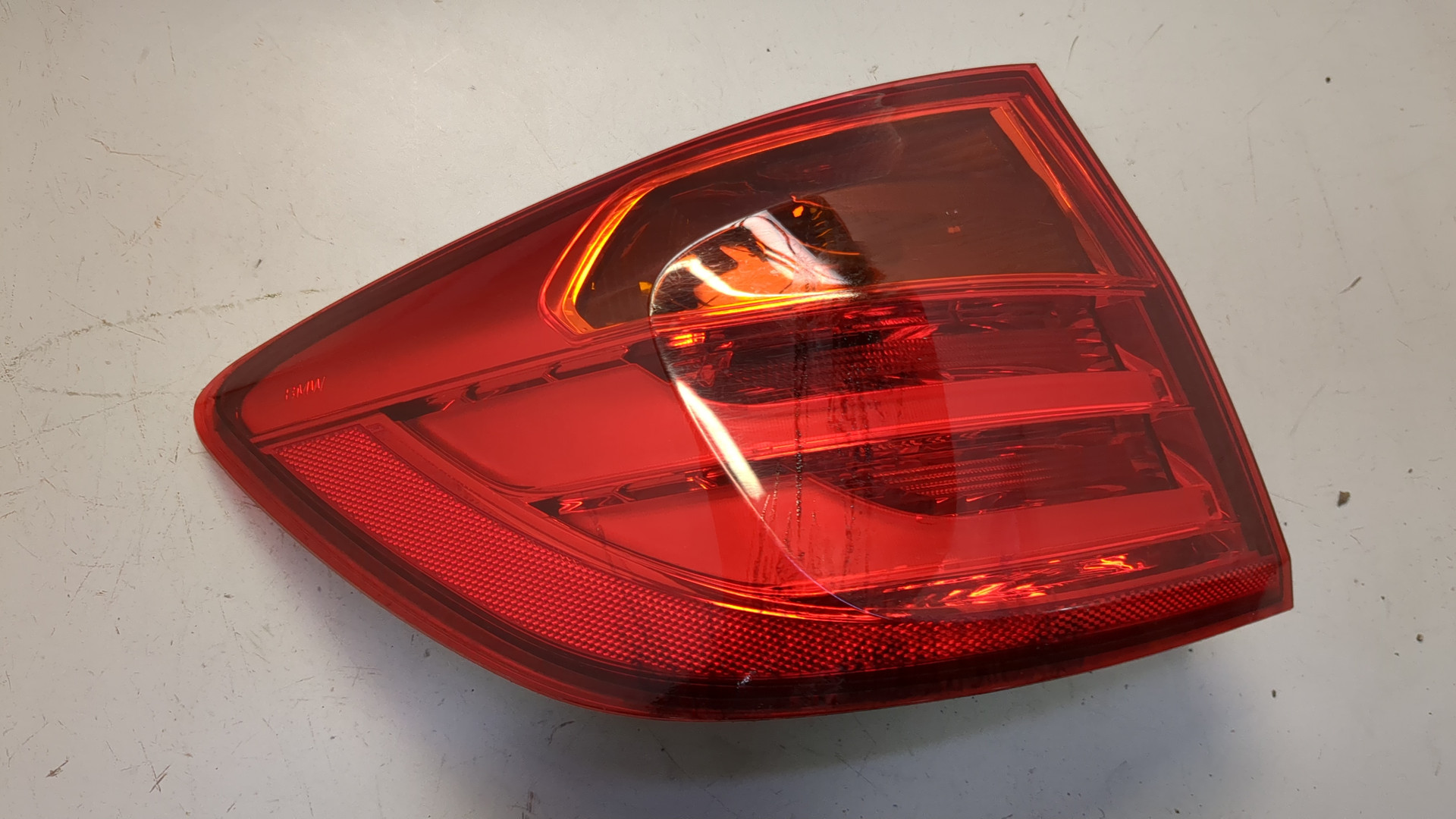 Фонарь задний левый