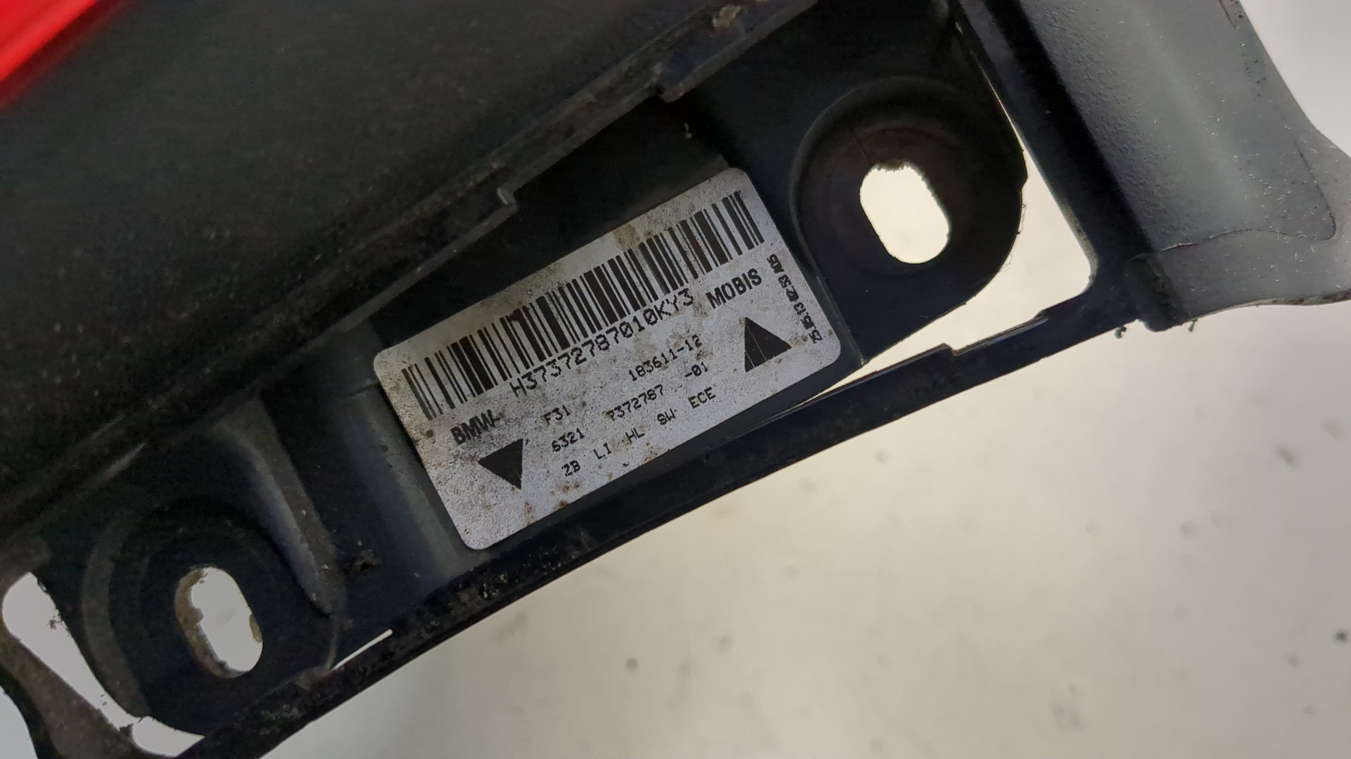 Фонарь задний левый