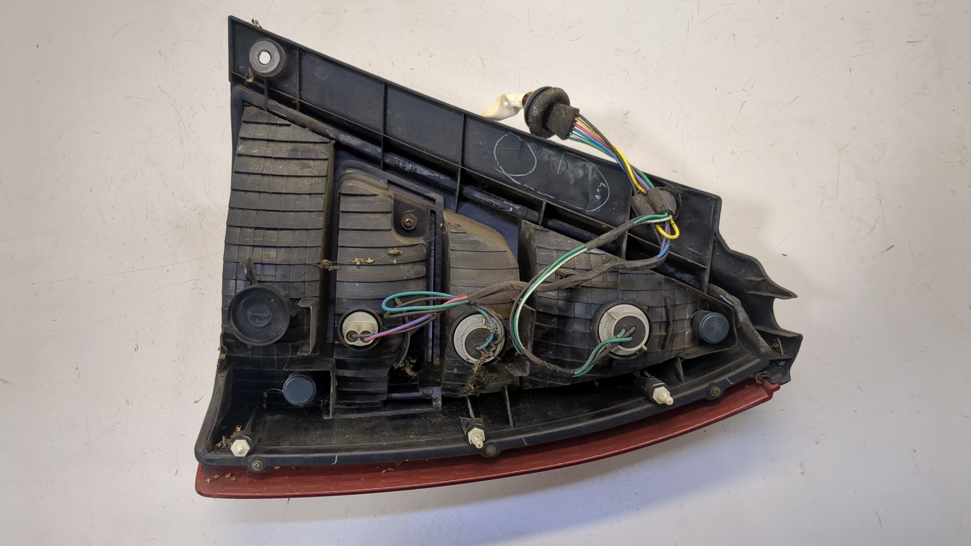 Фонарь задний левый