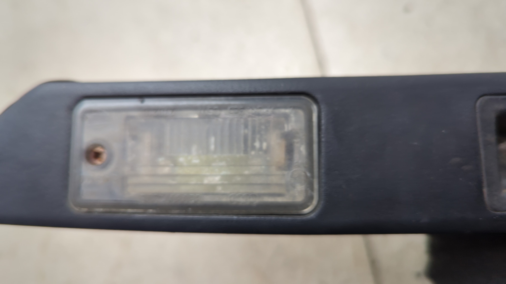 Фонарь подсветки номера