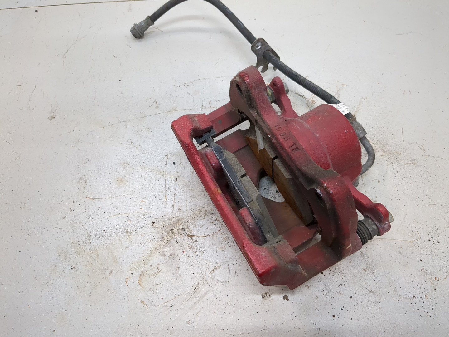 Суппорт передний левый