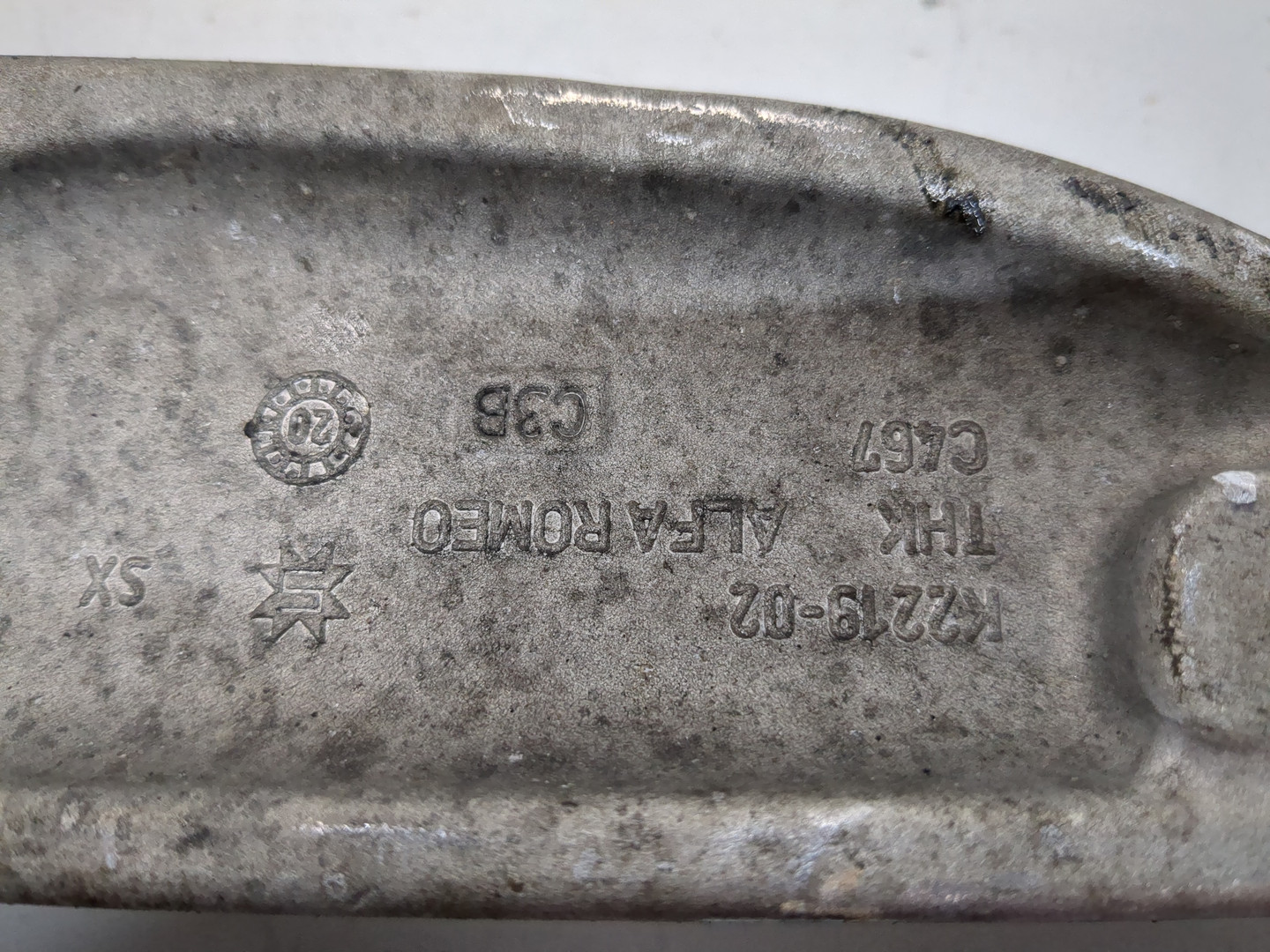 Рычаг передний левый