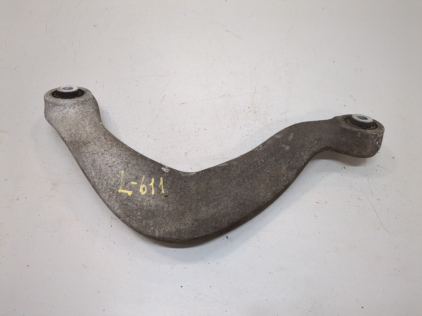 Рычаг задний левый