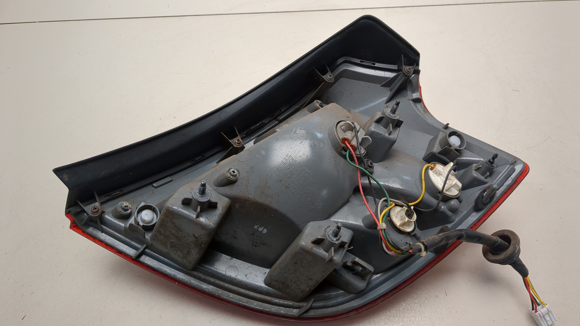 Фонарь задний левый