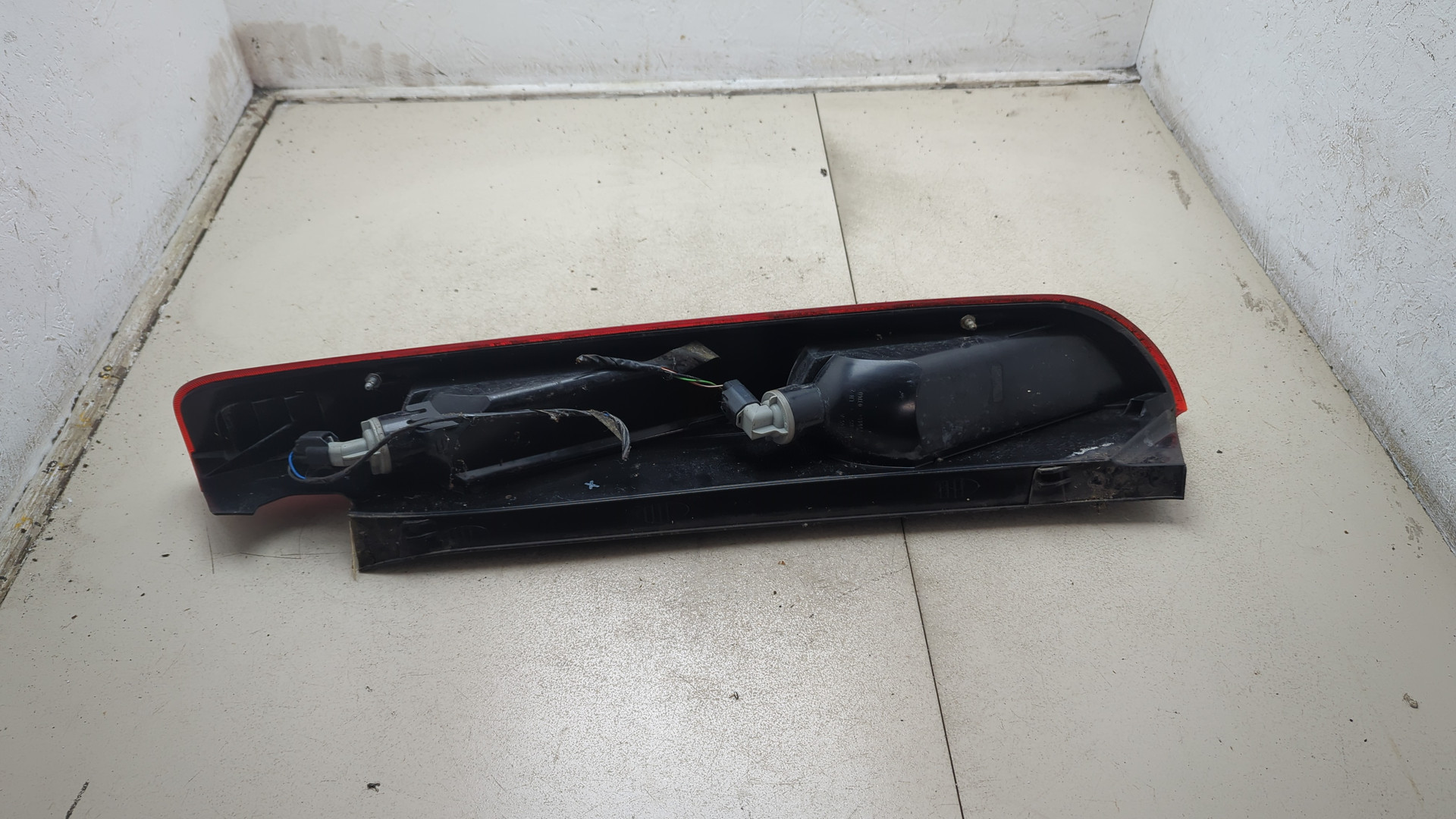 Фонарь задний левый