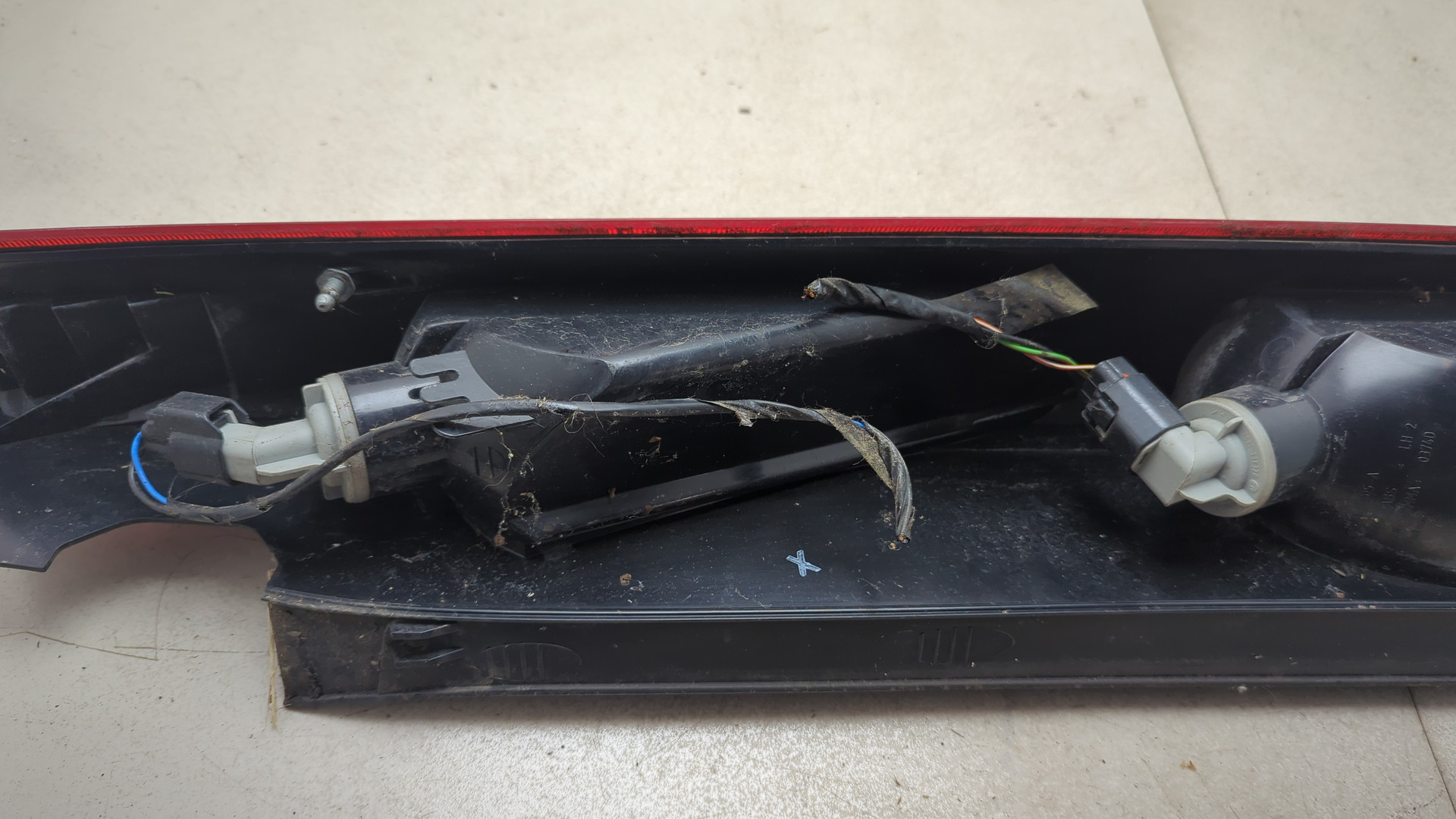 Фонарь задний левый