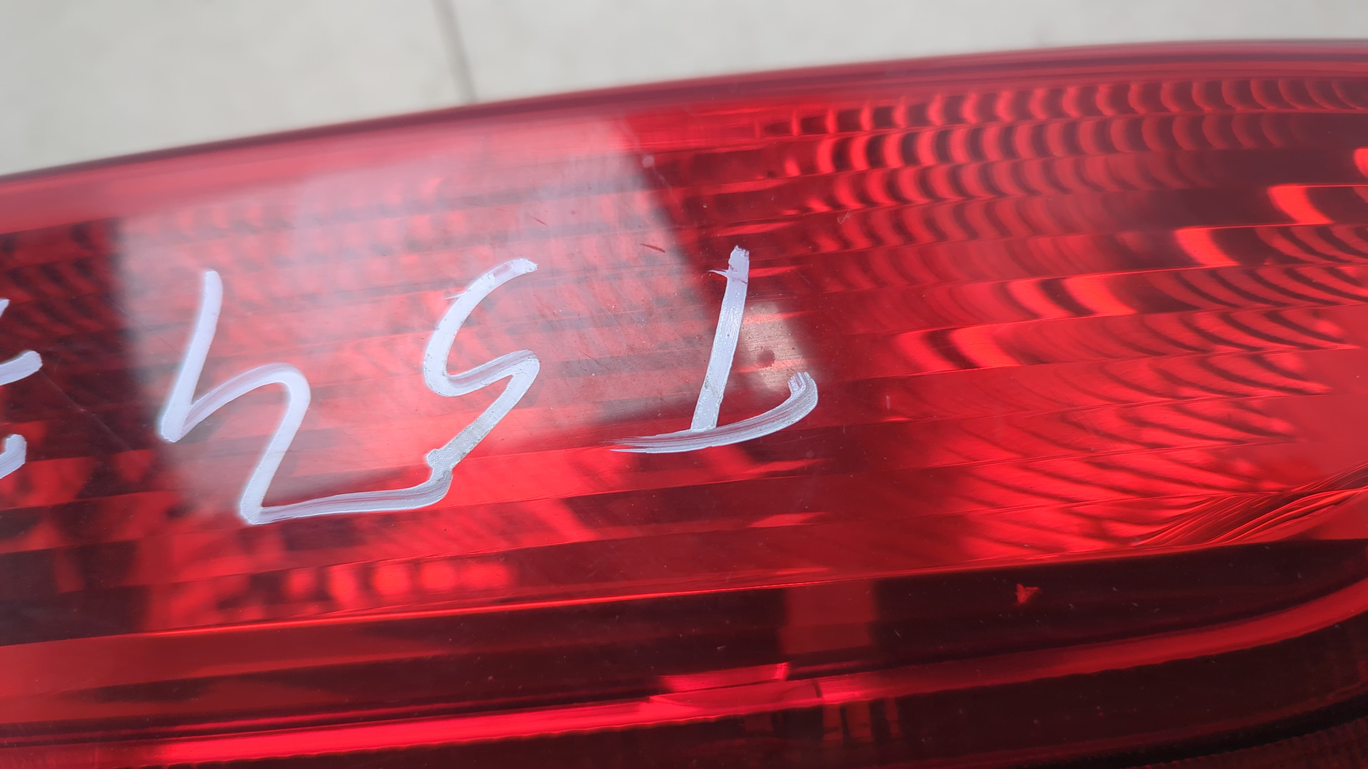 Фонарь задний левый