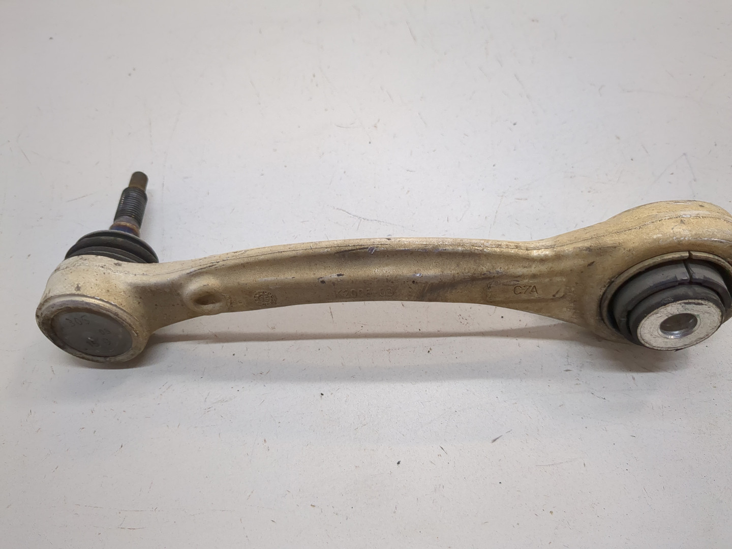 Рычаг задний левый