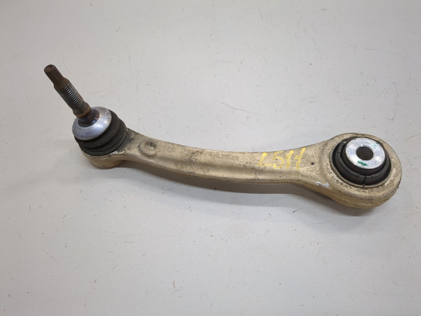 Рычаг задний левый
