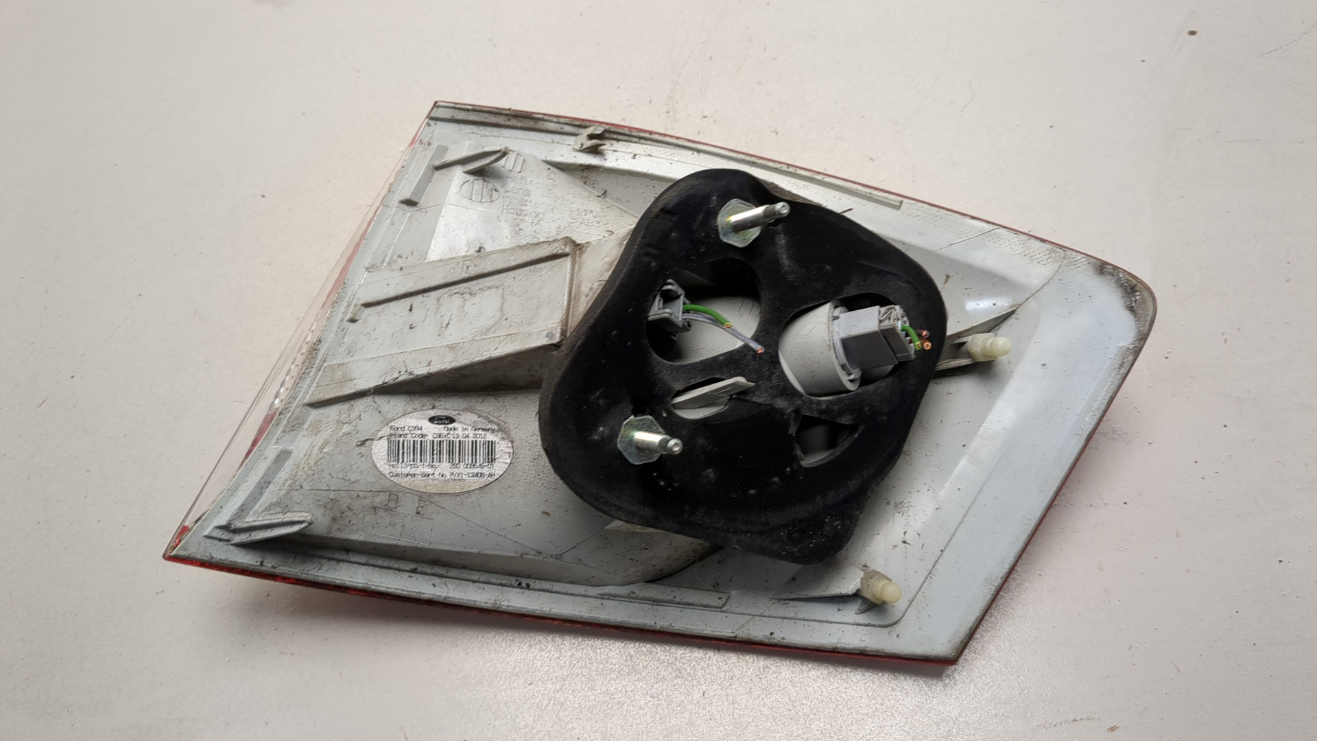 Фонарь задний левый