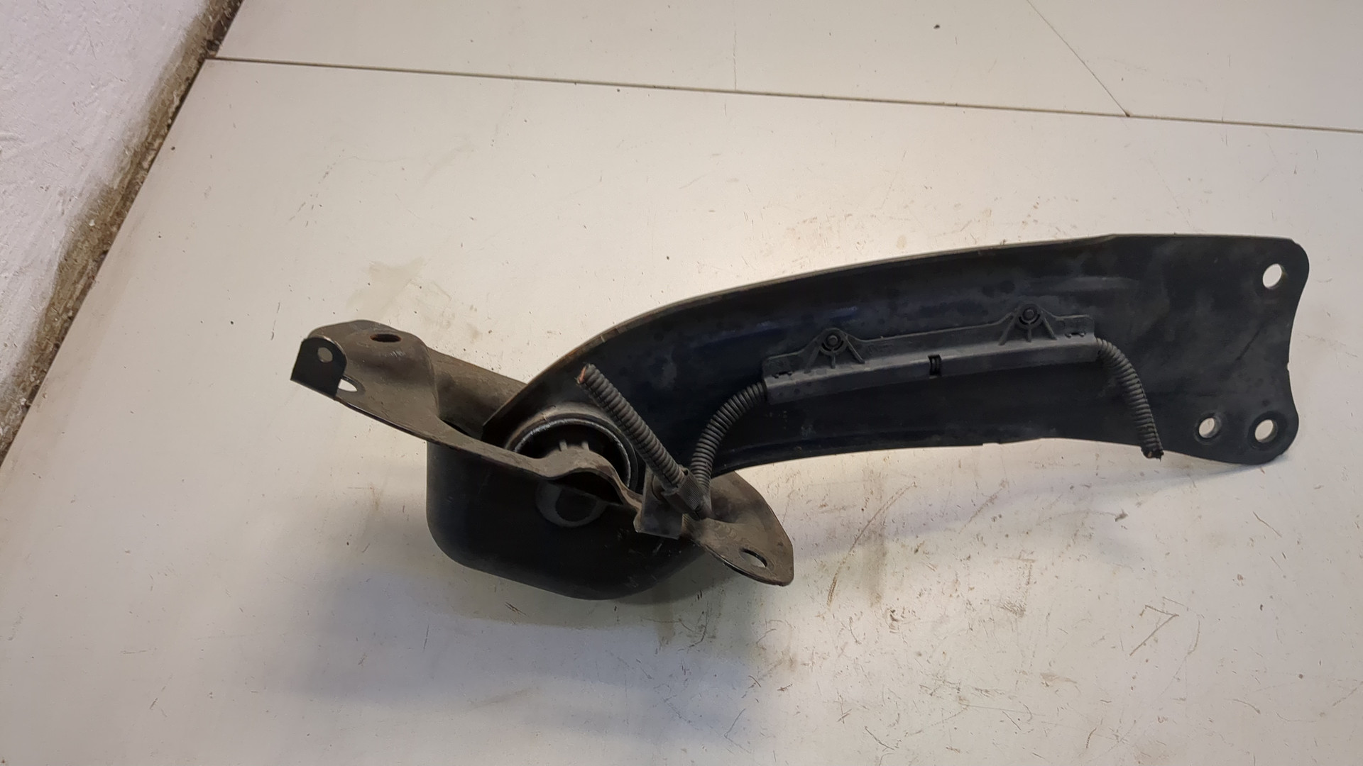 Рычаг задний левый