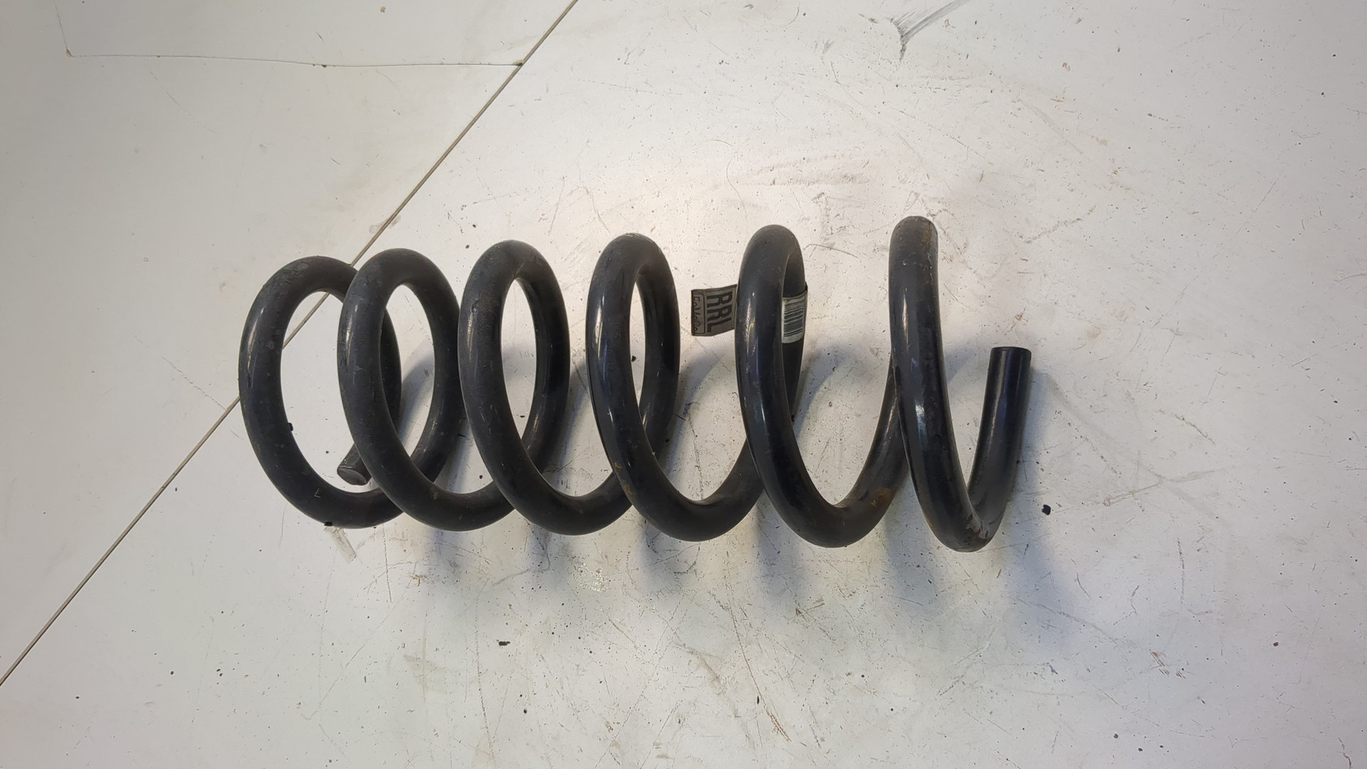 Пружина задняя