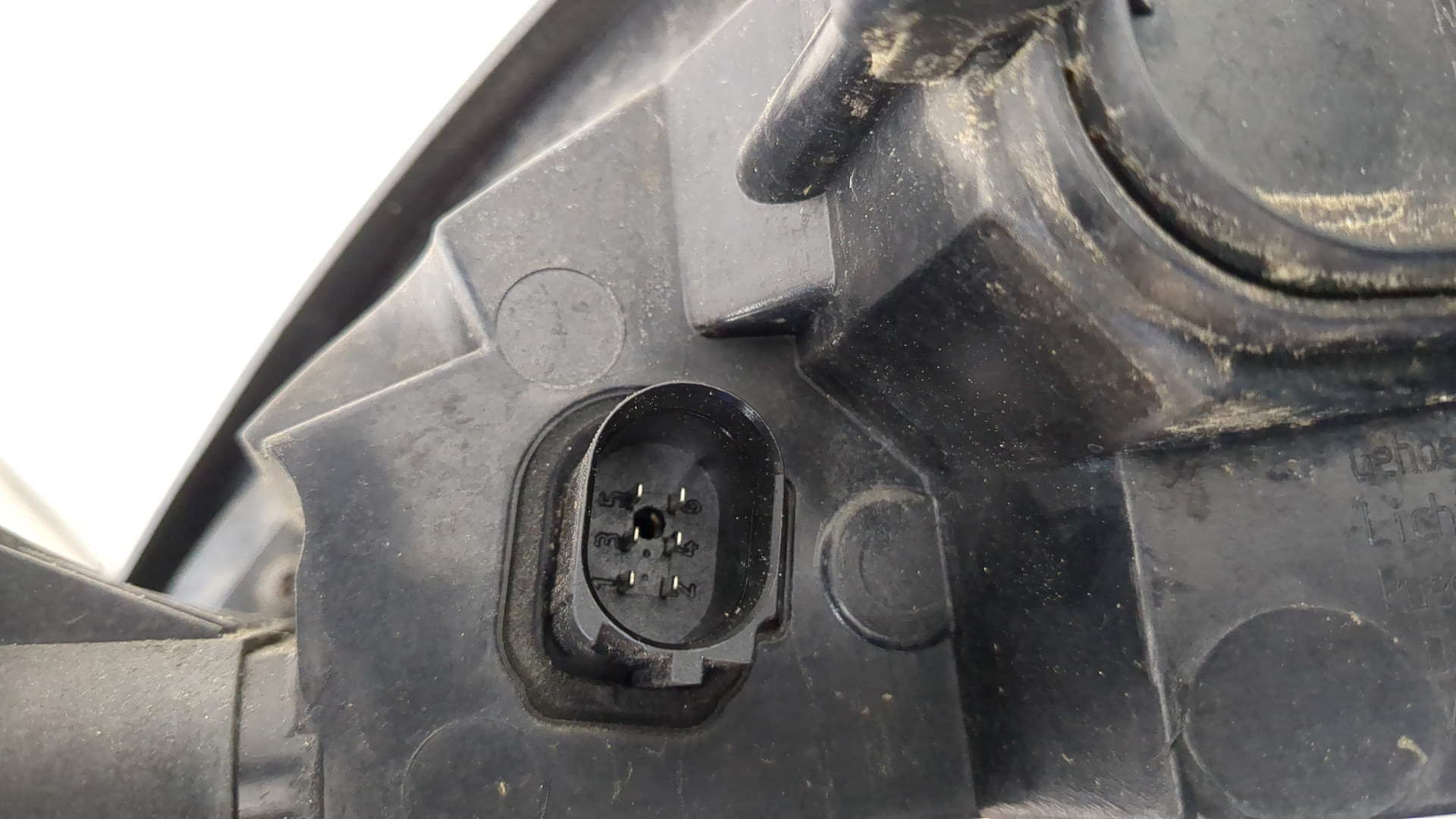 Фонарь задний левый