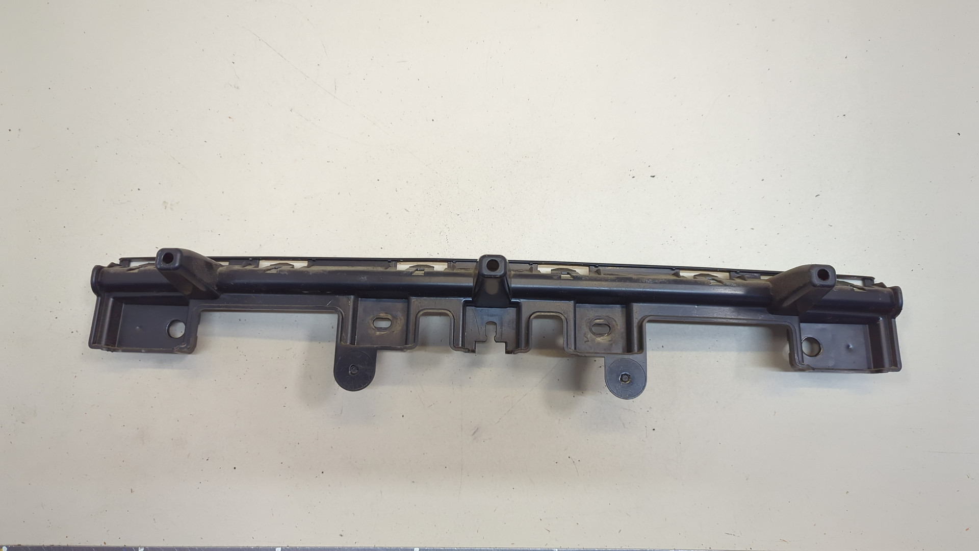 Кронштейн заднего бампера