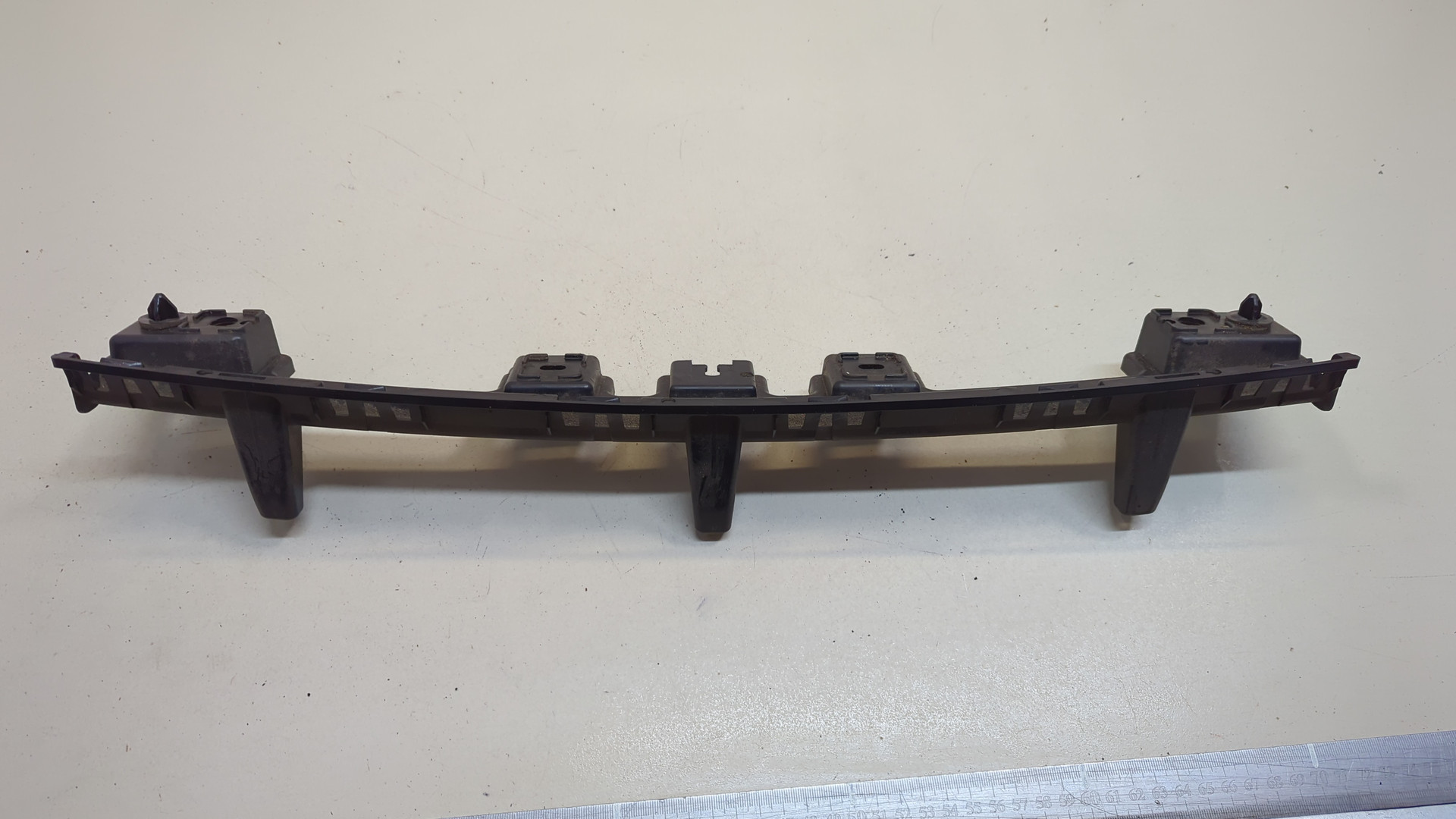 Кронштейн заднего бампера