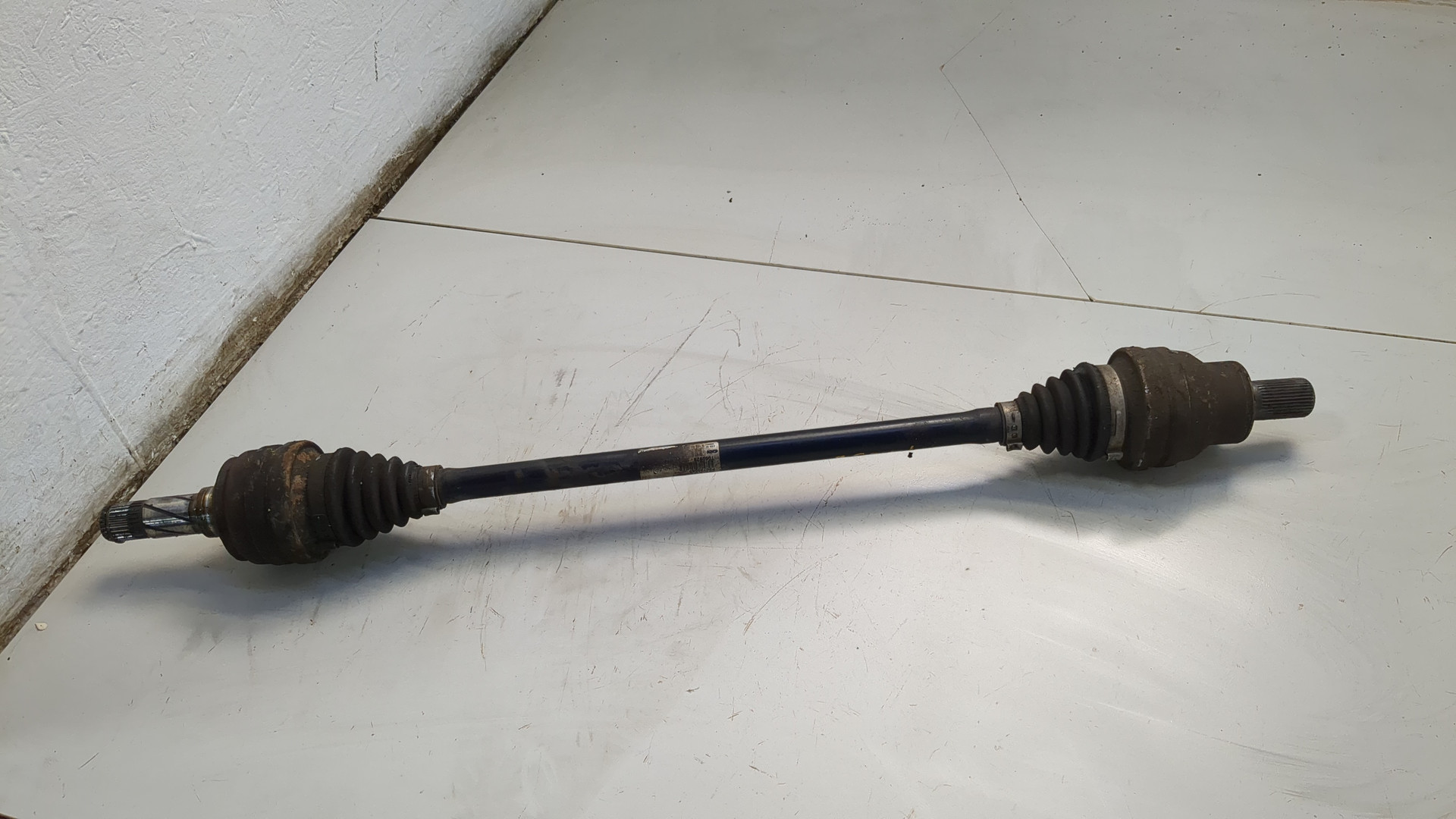 Полуось задняя левая