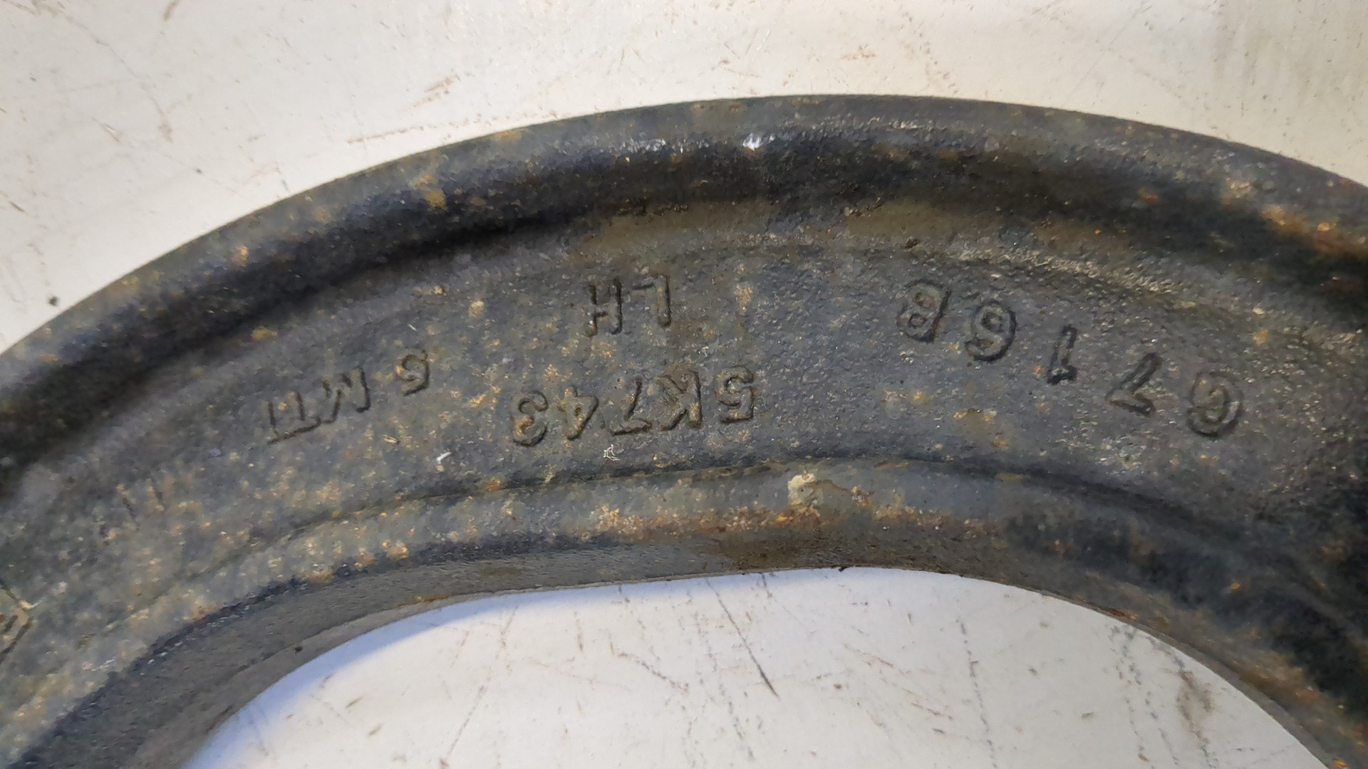 Рычаг задний левый