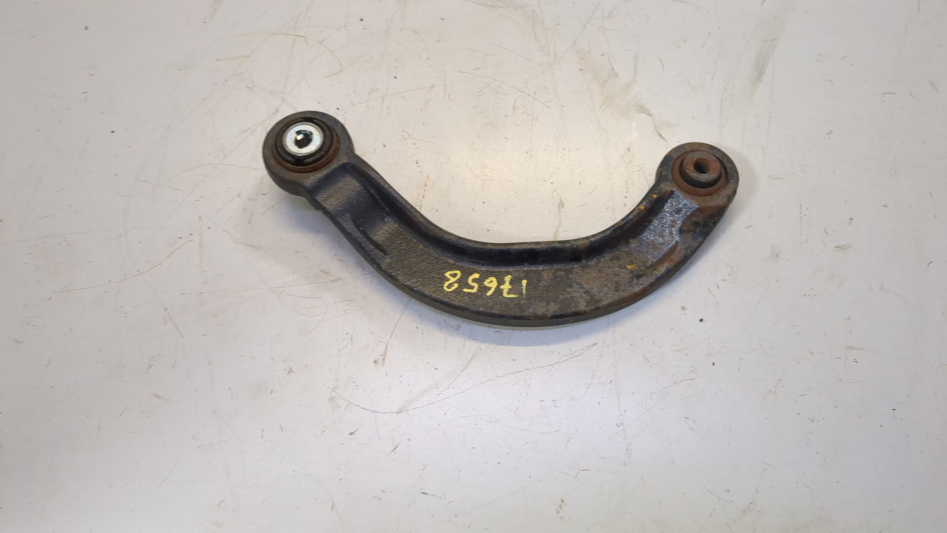 Рычаг задний левый