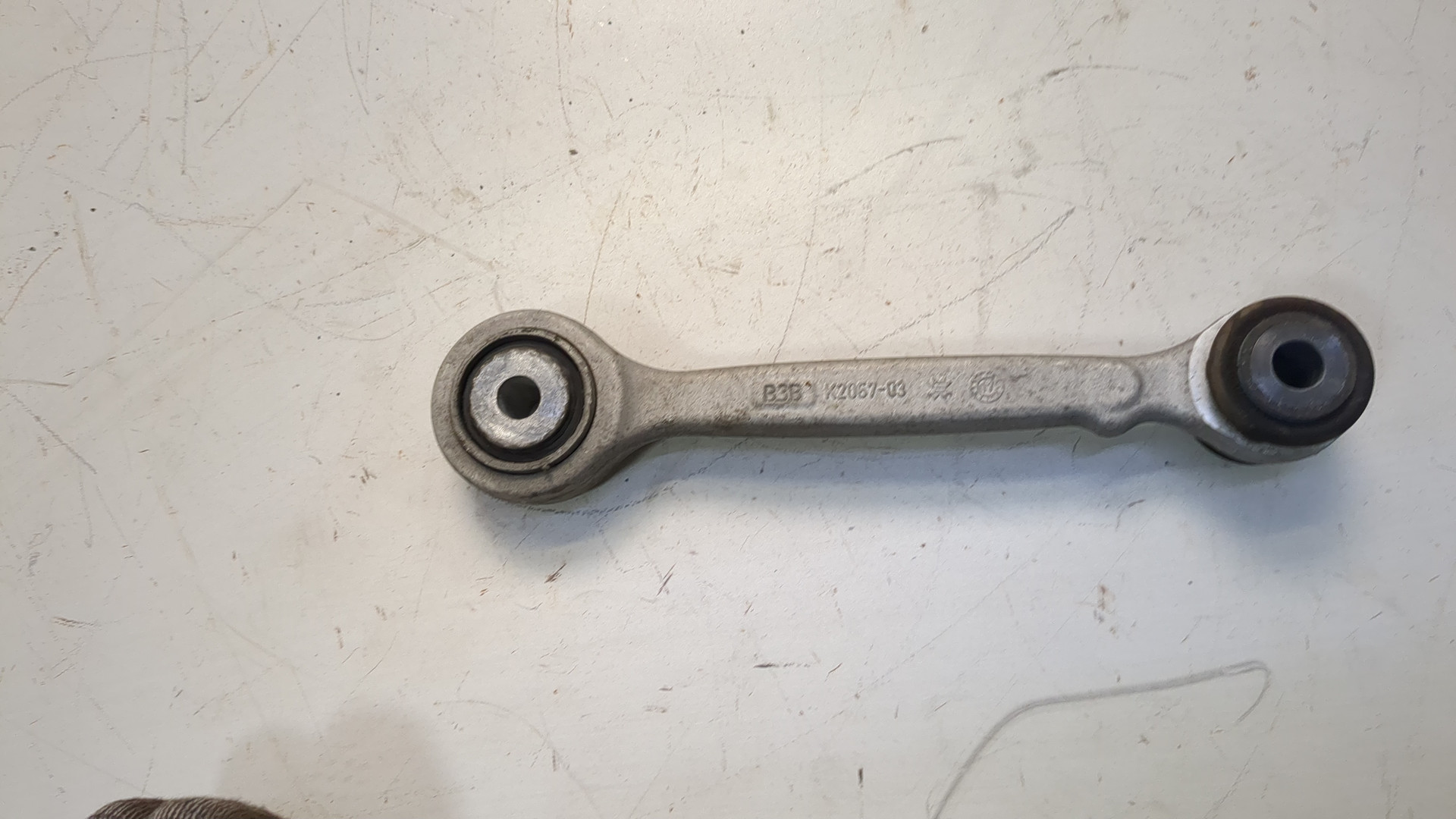 Рычаг задний