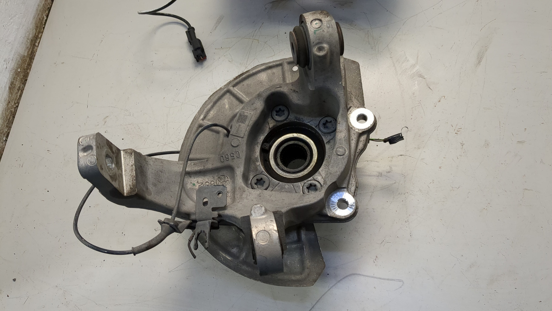 Кулак поворотный задний левый