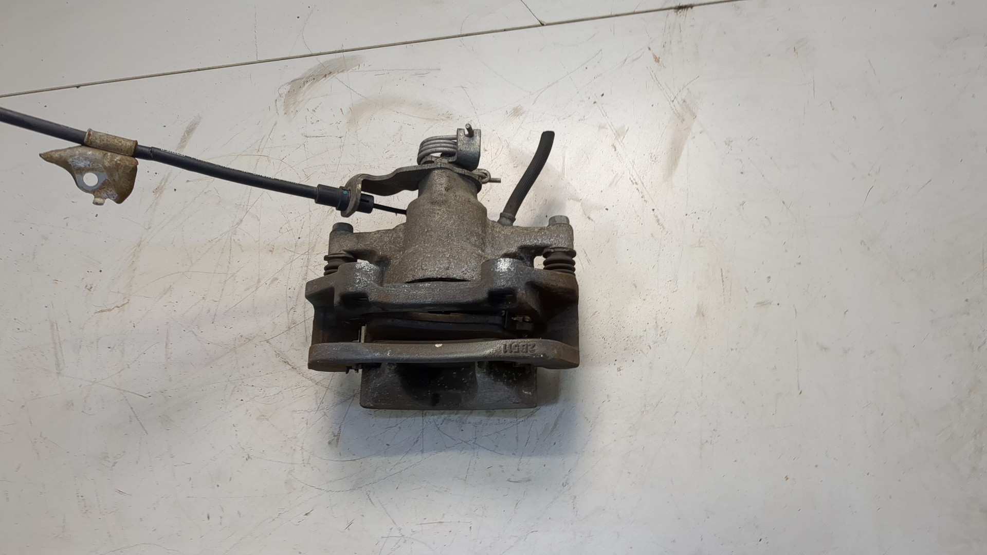 Суппорт задний левый