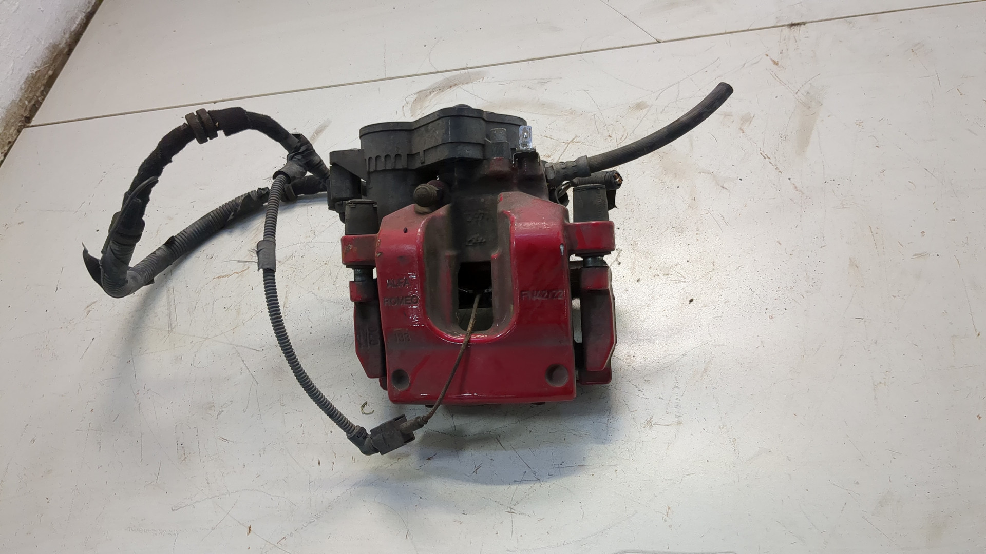 Суппорт задний левый