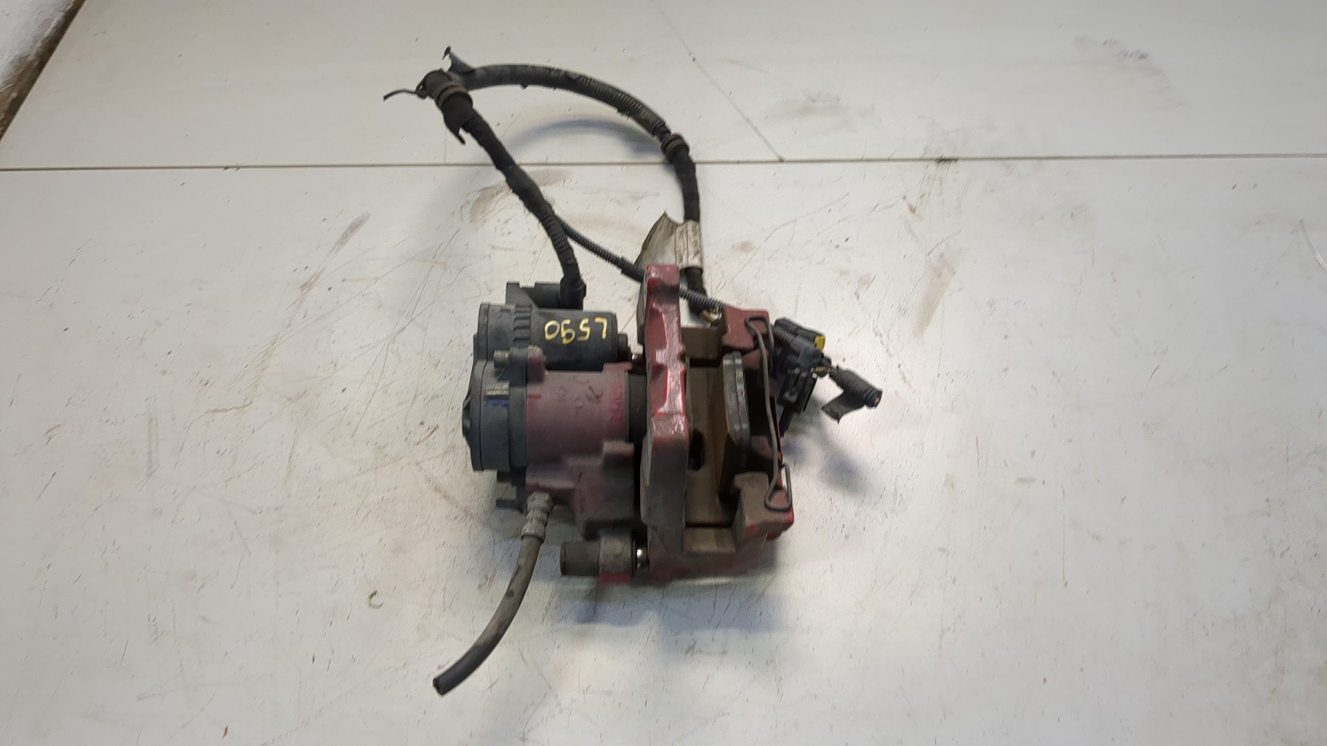 Суппорт задний левый