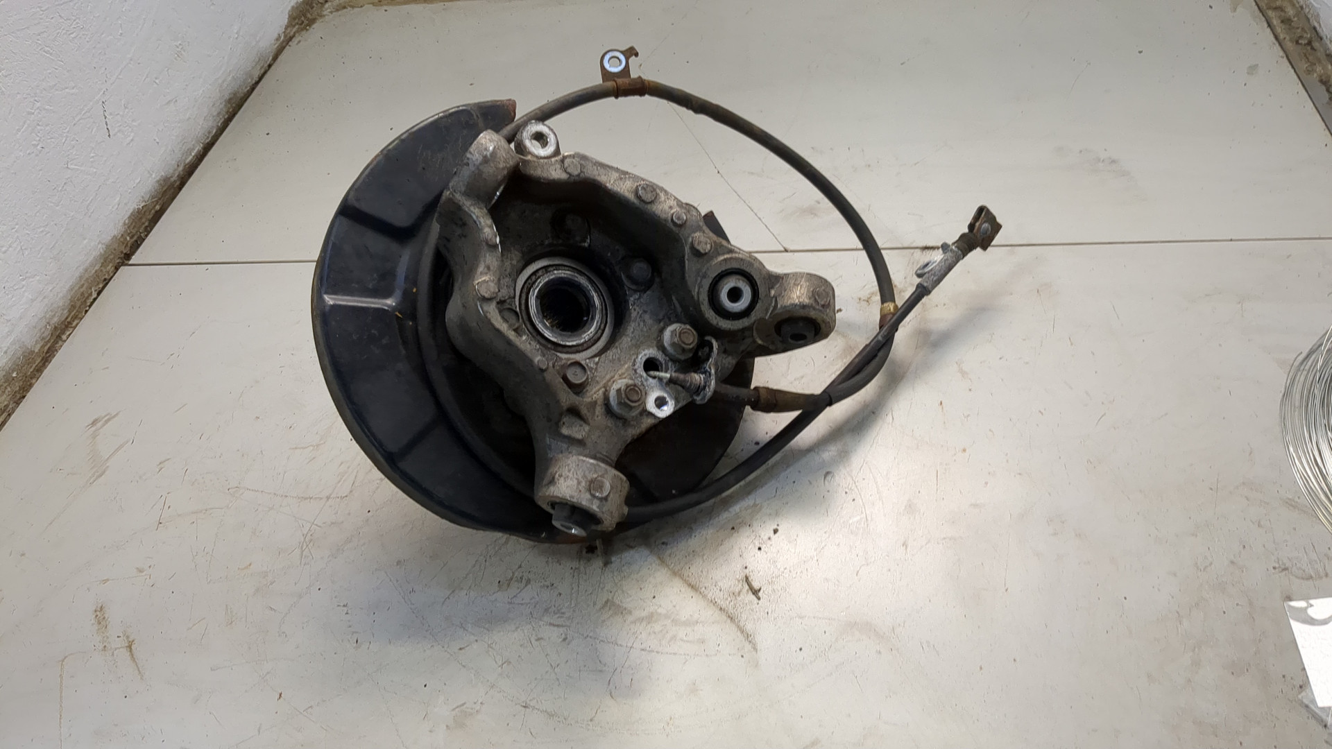 Кулак поворотный задний левый