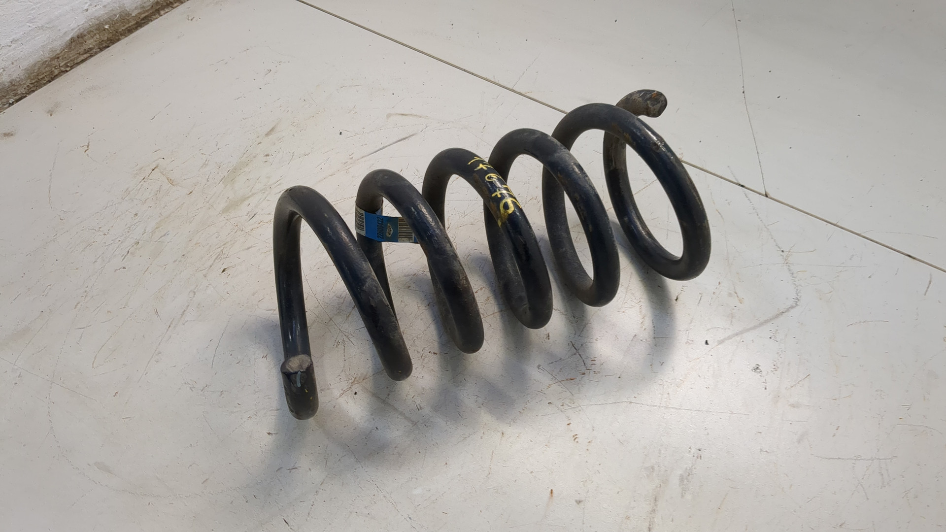 Пружина задняя