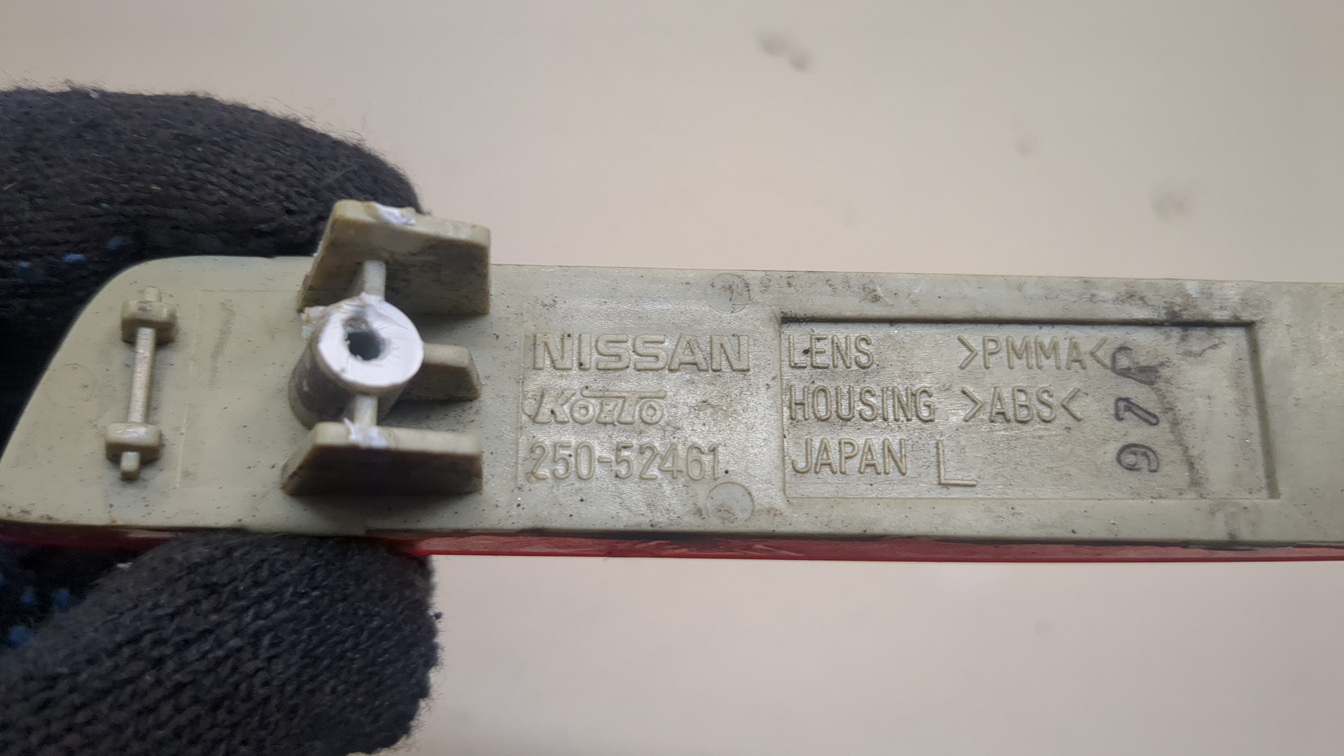 Отражатель в бампер задний левый