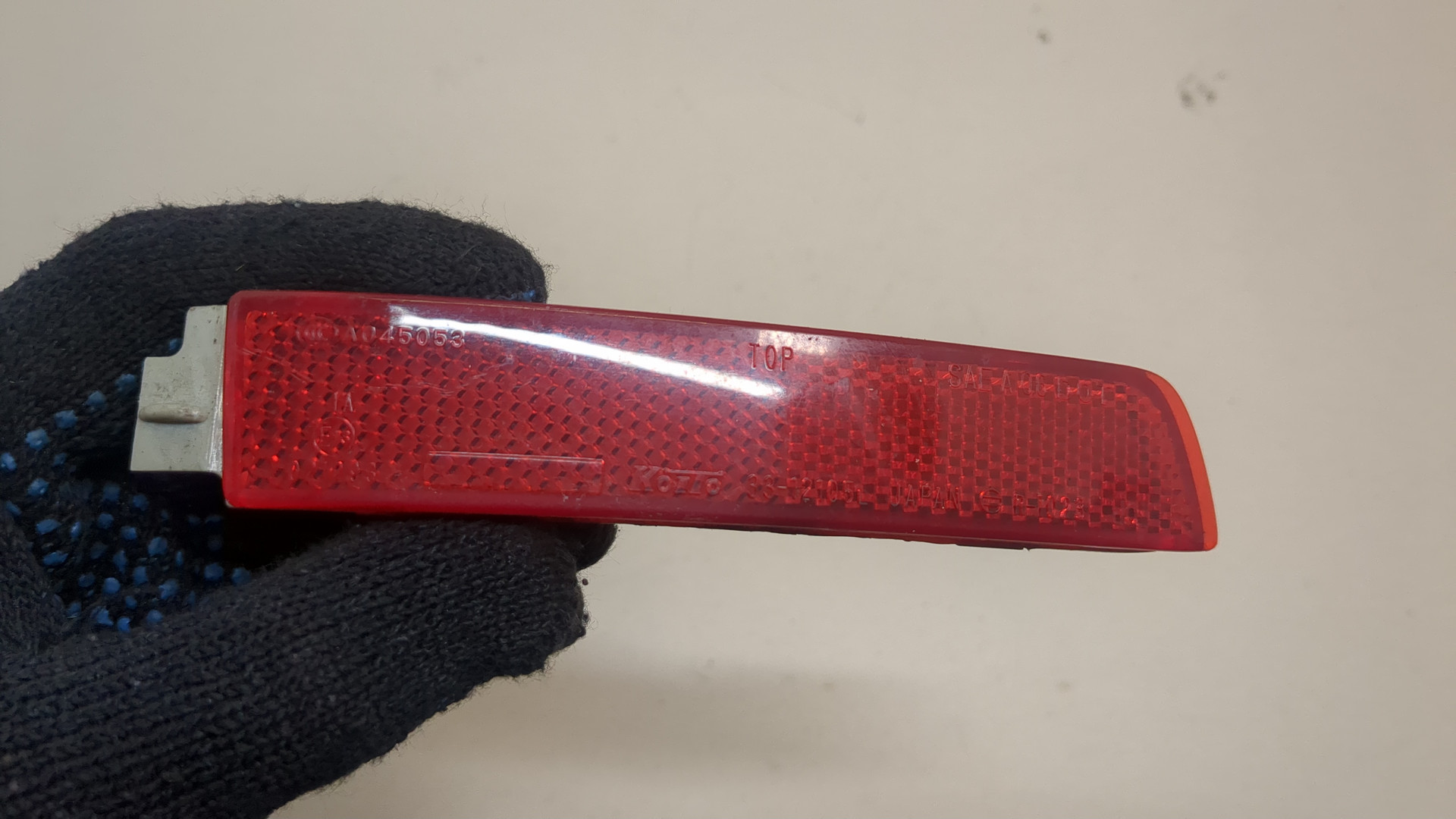 Отражатель в бампер задний левый