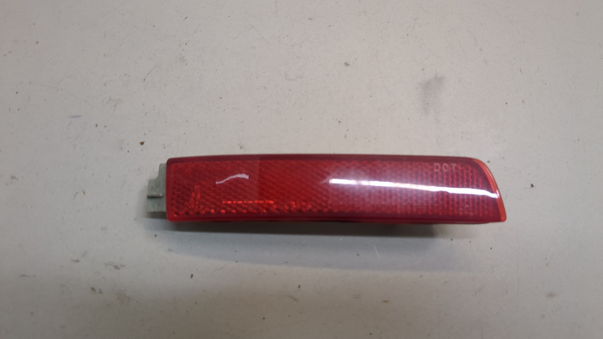 Отражатель в бампер задний левый