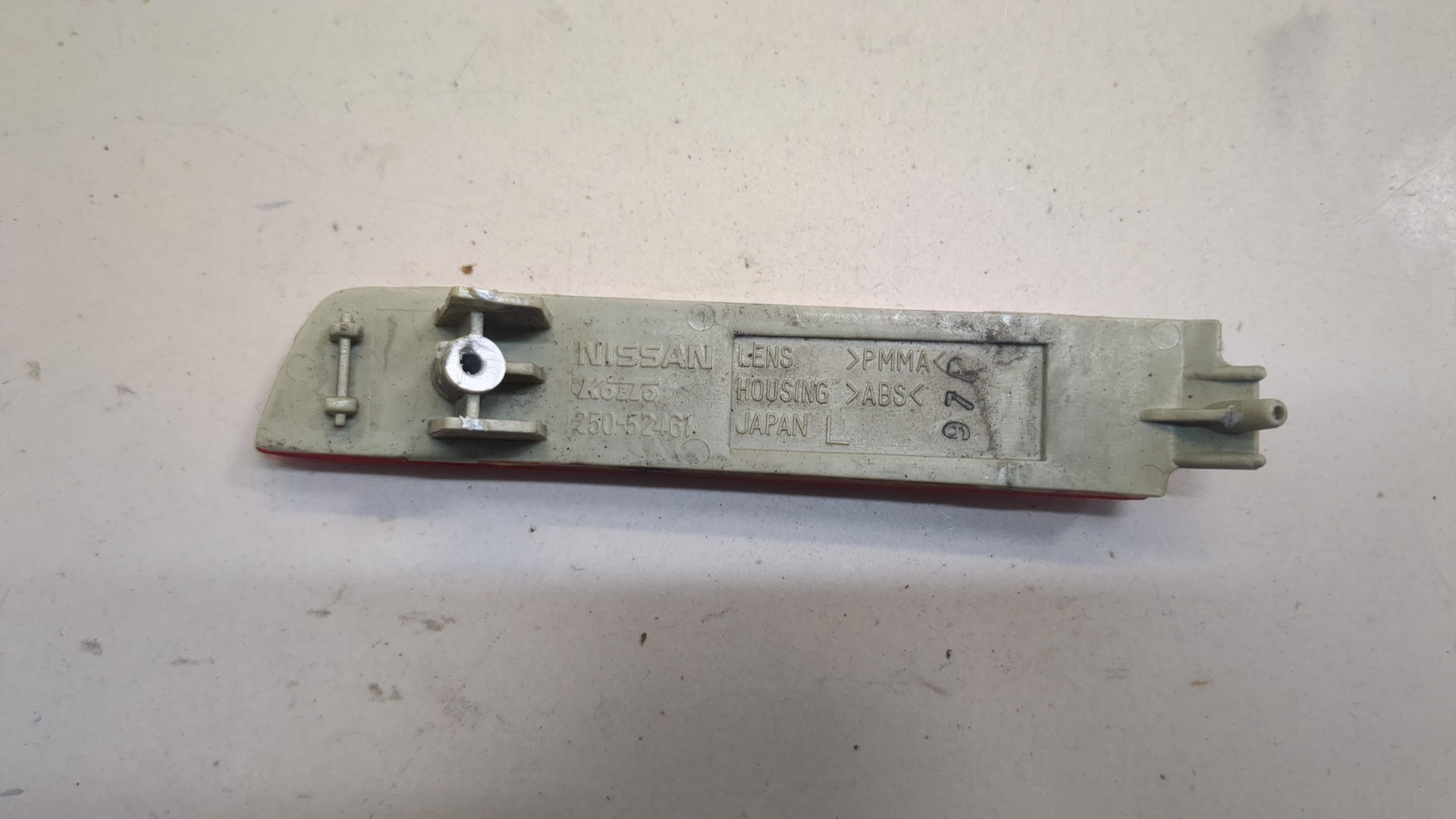 Отражатель в бампер задний левый