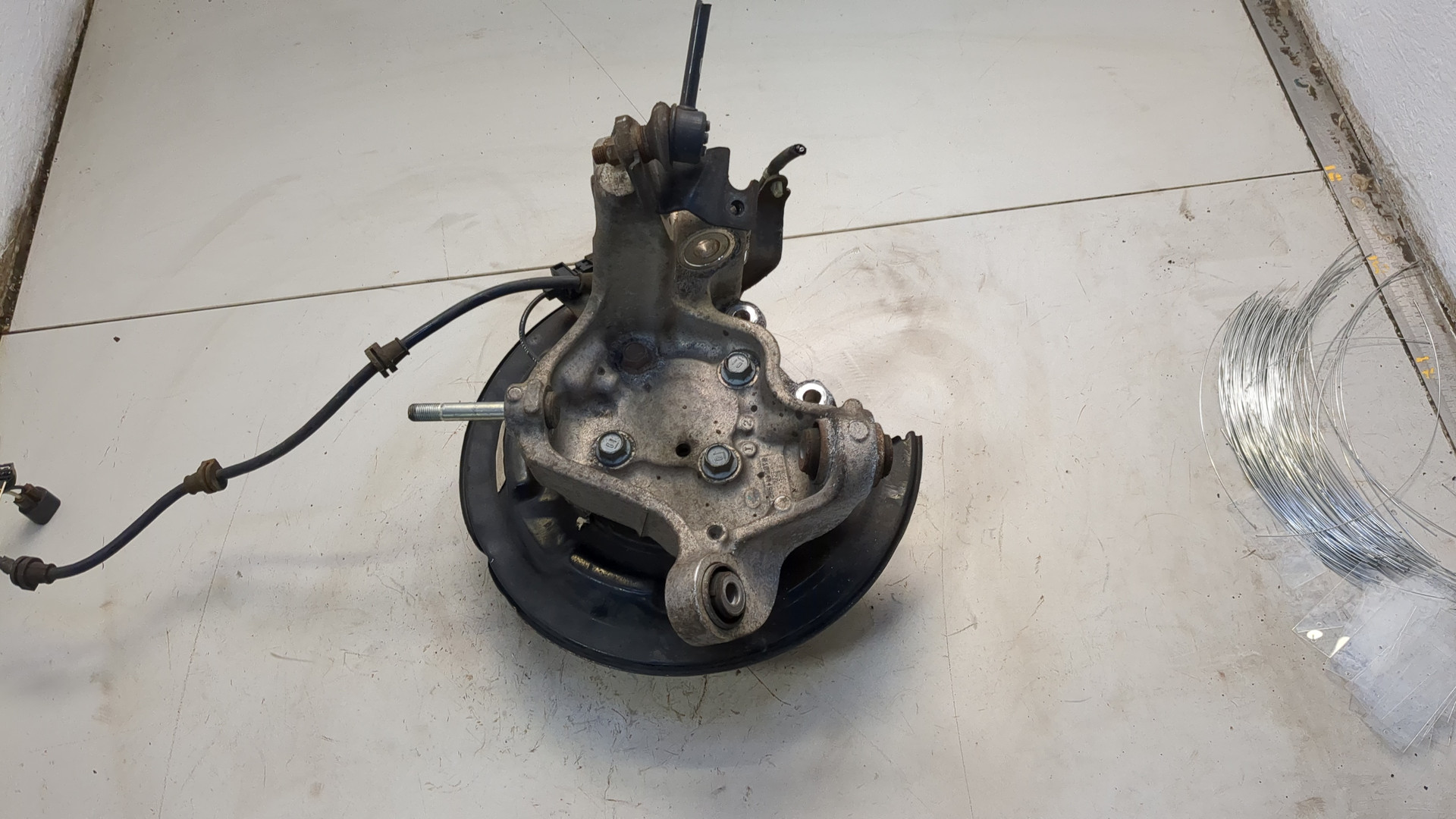 Кулак поворотный задний левый