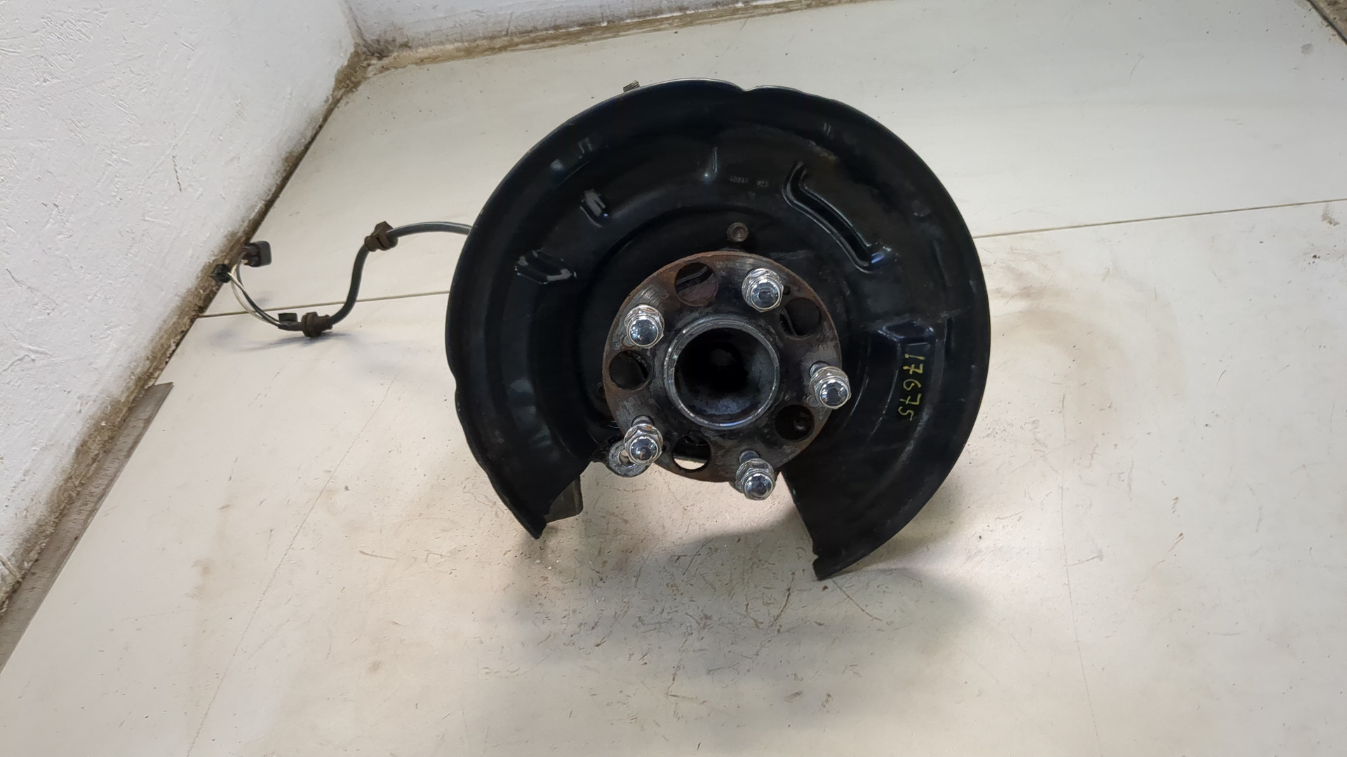 Кулак поворотный задний левый