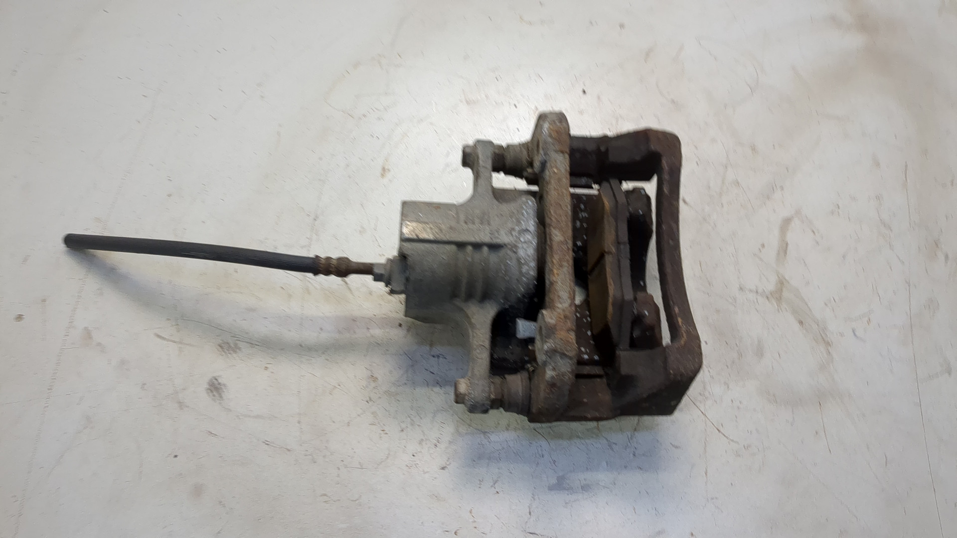 Суппорт задний левый