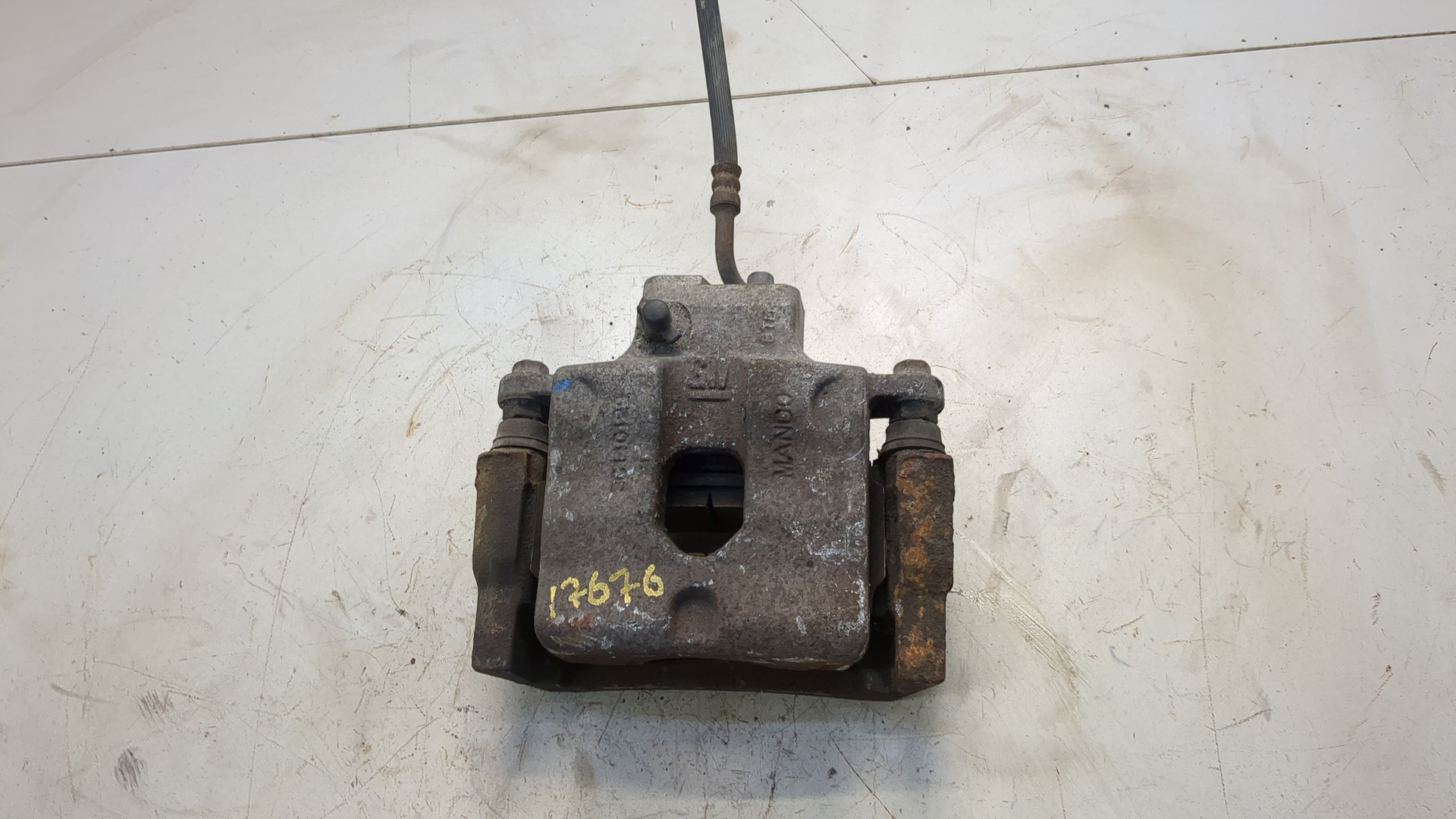 Суппорт задний левый