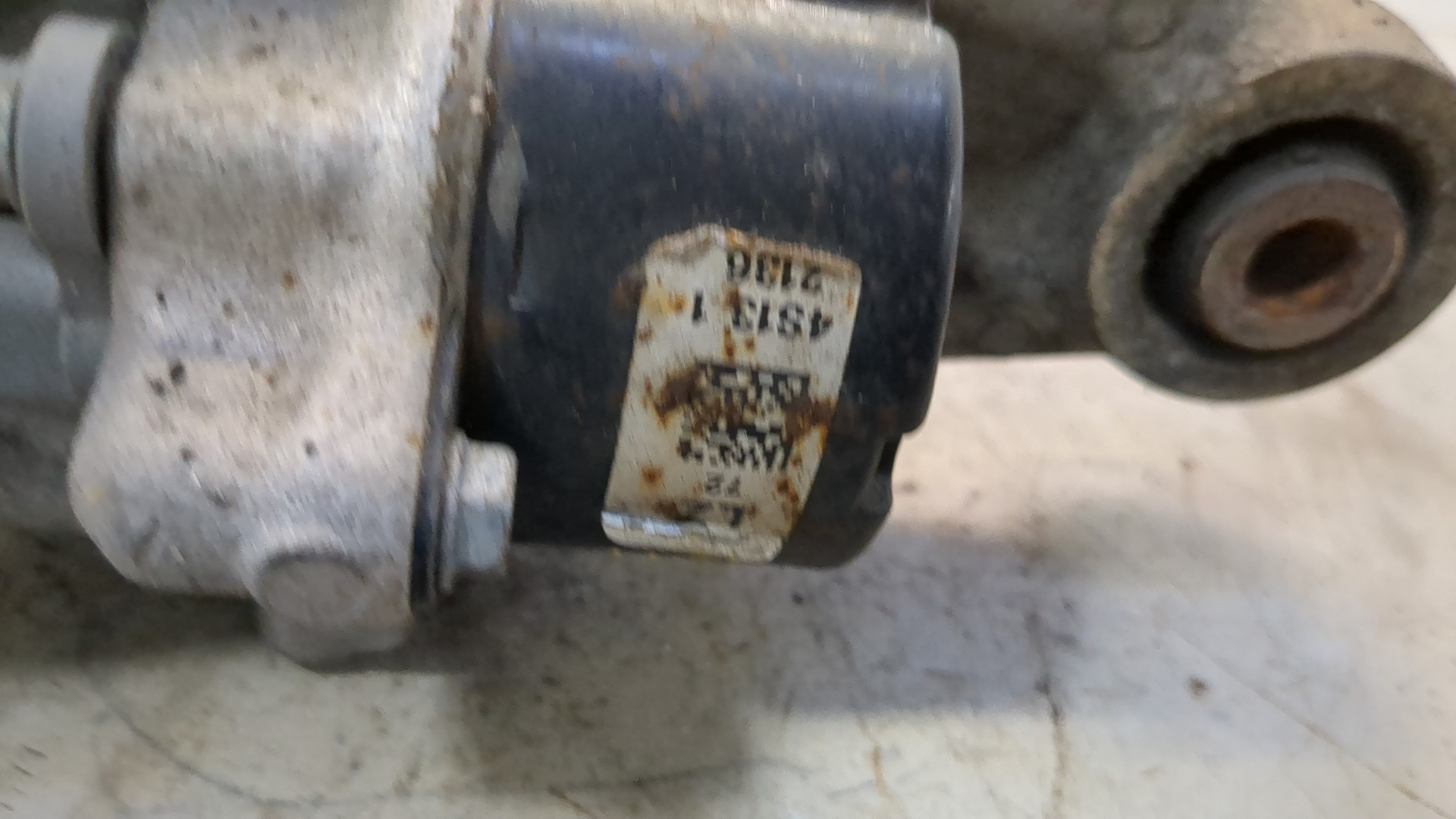 Рычаг задний левый